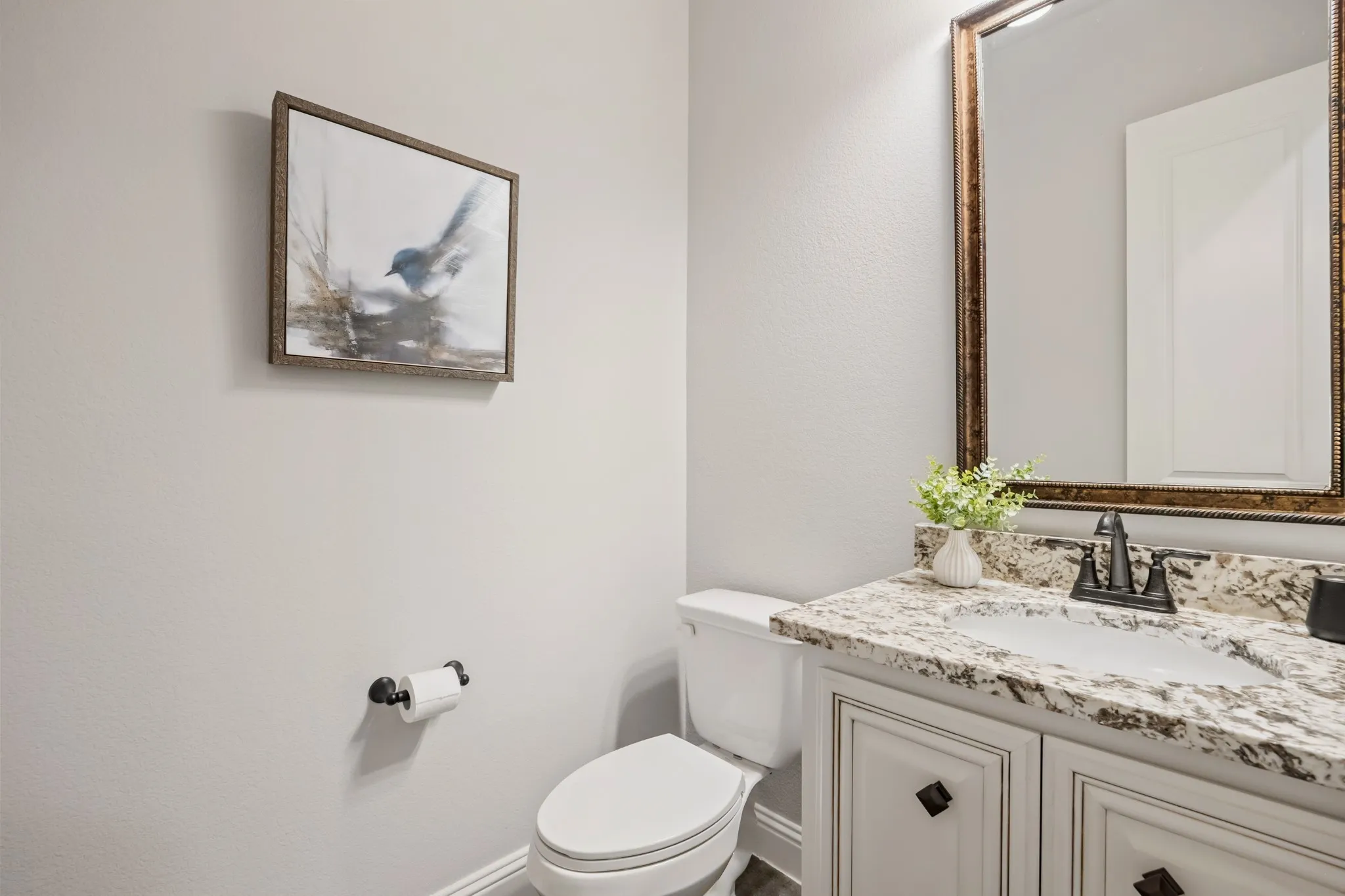 Half bath near laundry and mudroom