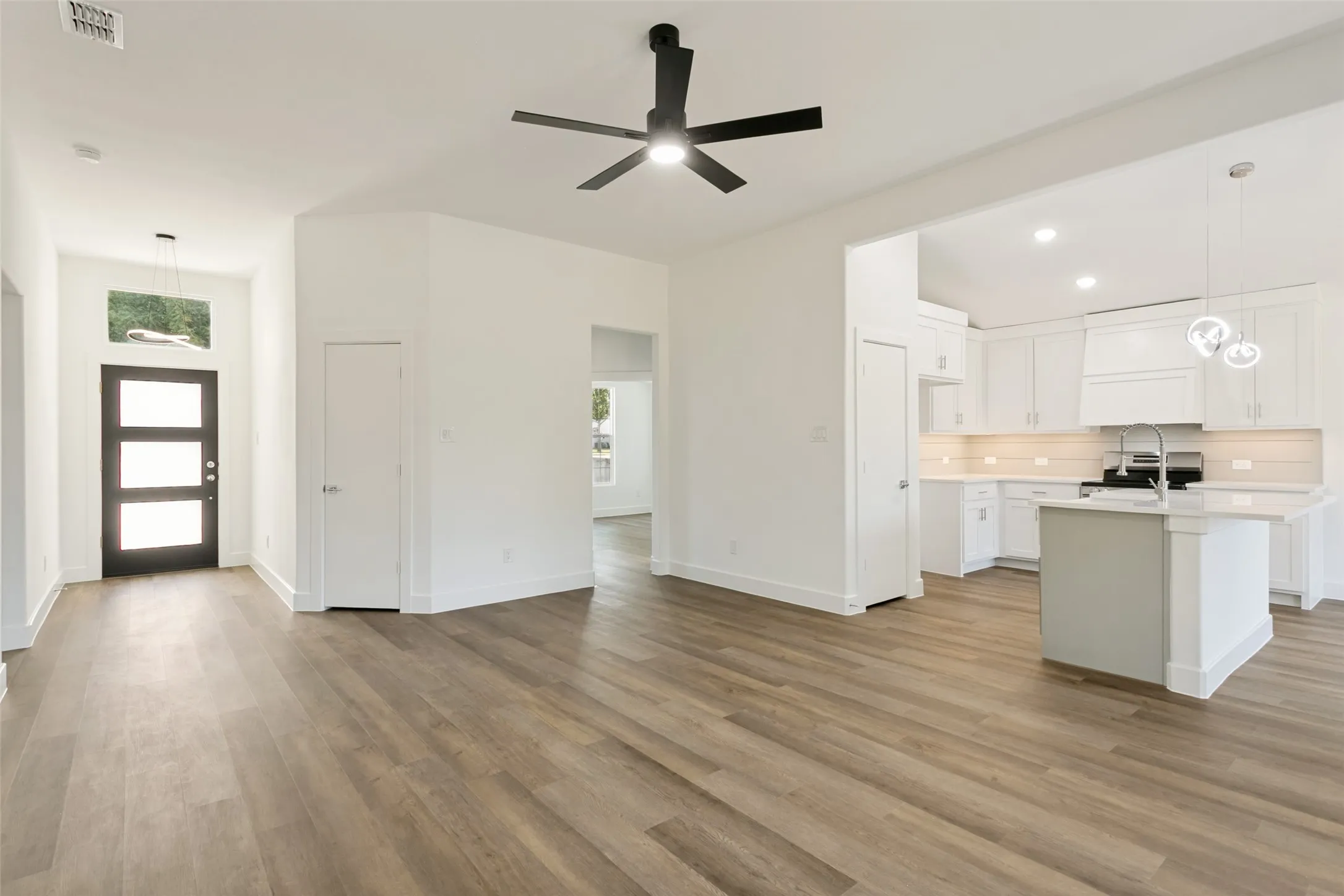 Open concept kitchen, living & dining