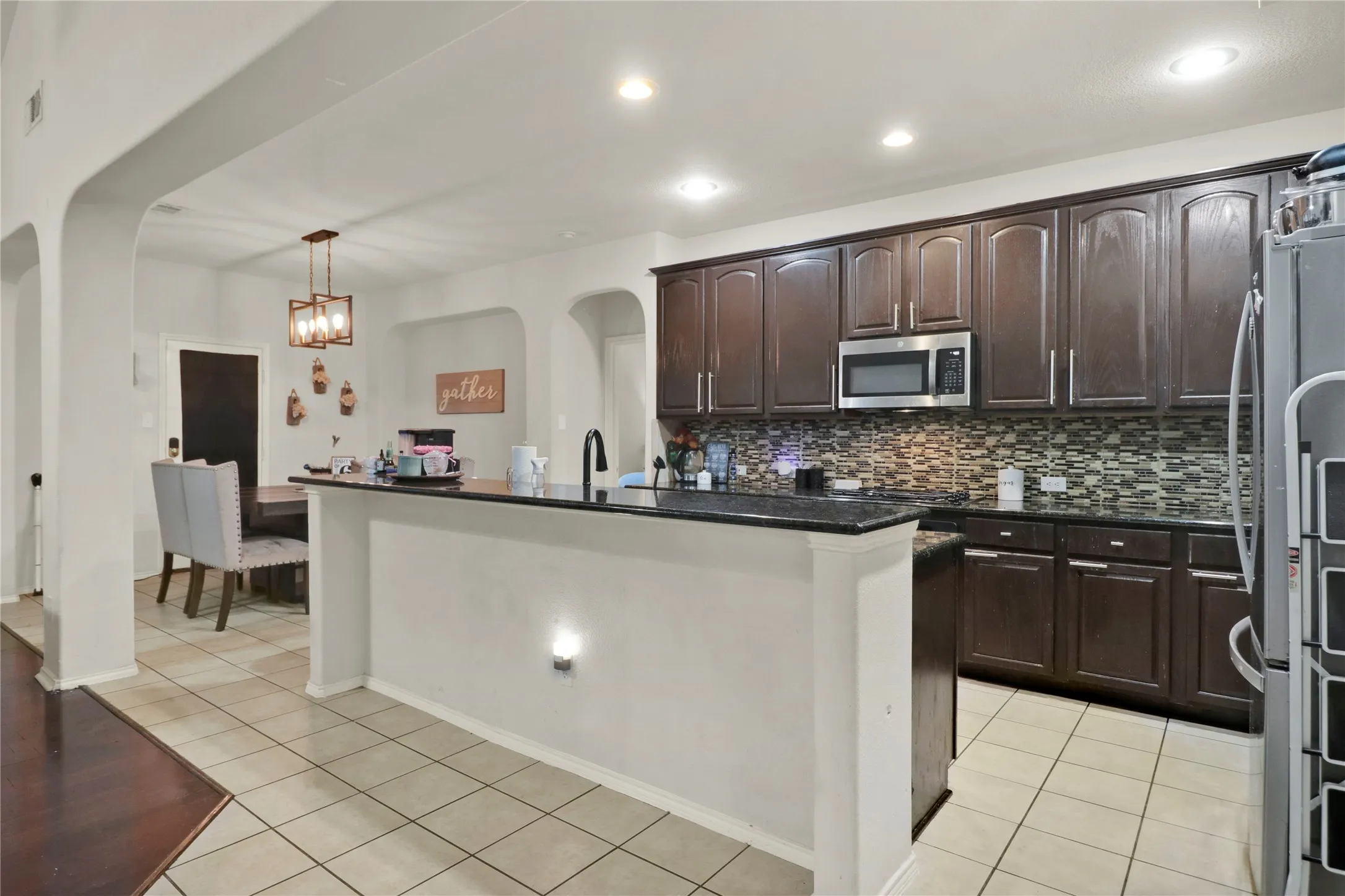 Kitchen with breakfast bar.
