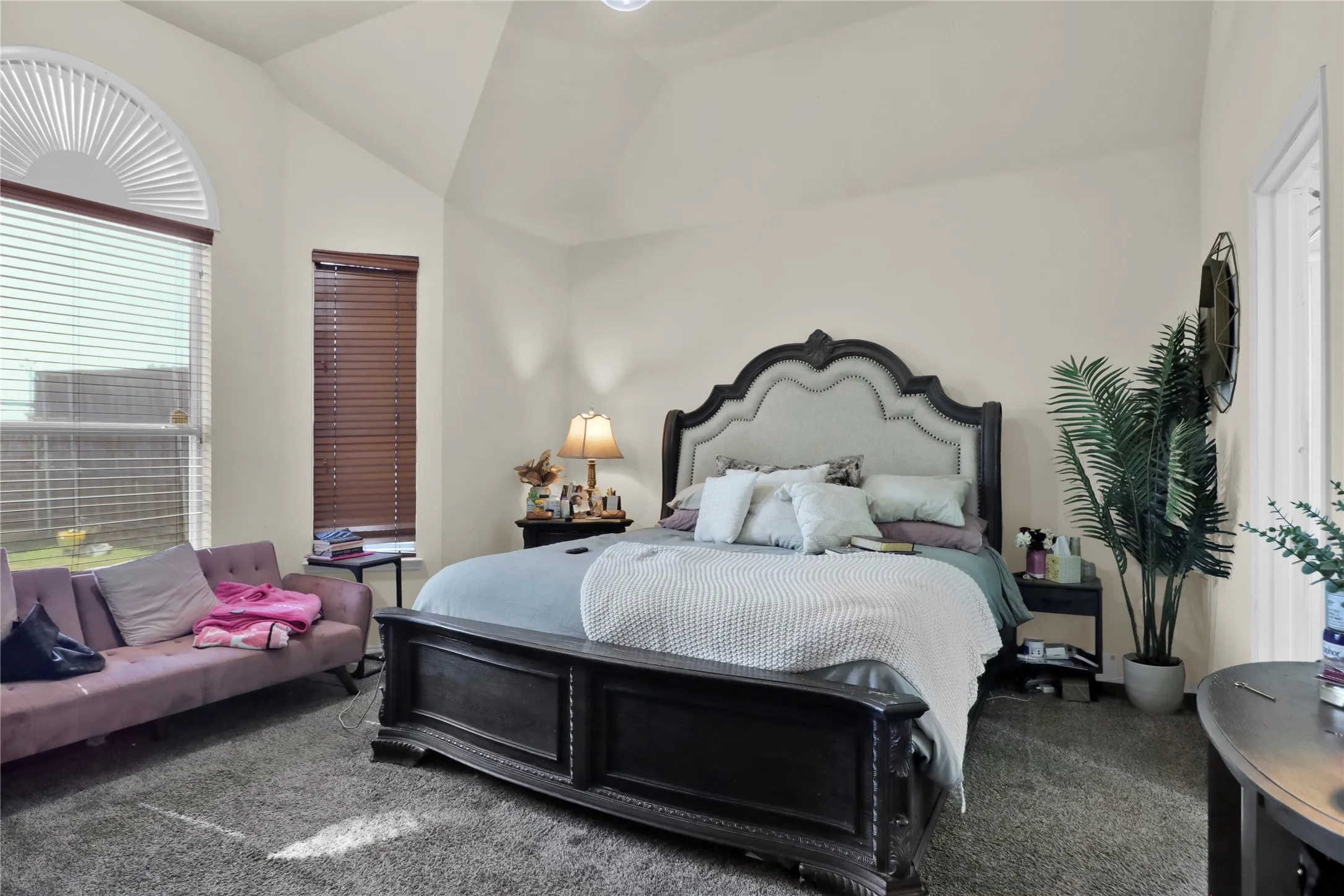 Master suite with sitting area overlooking back yard.