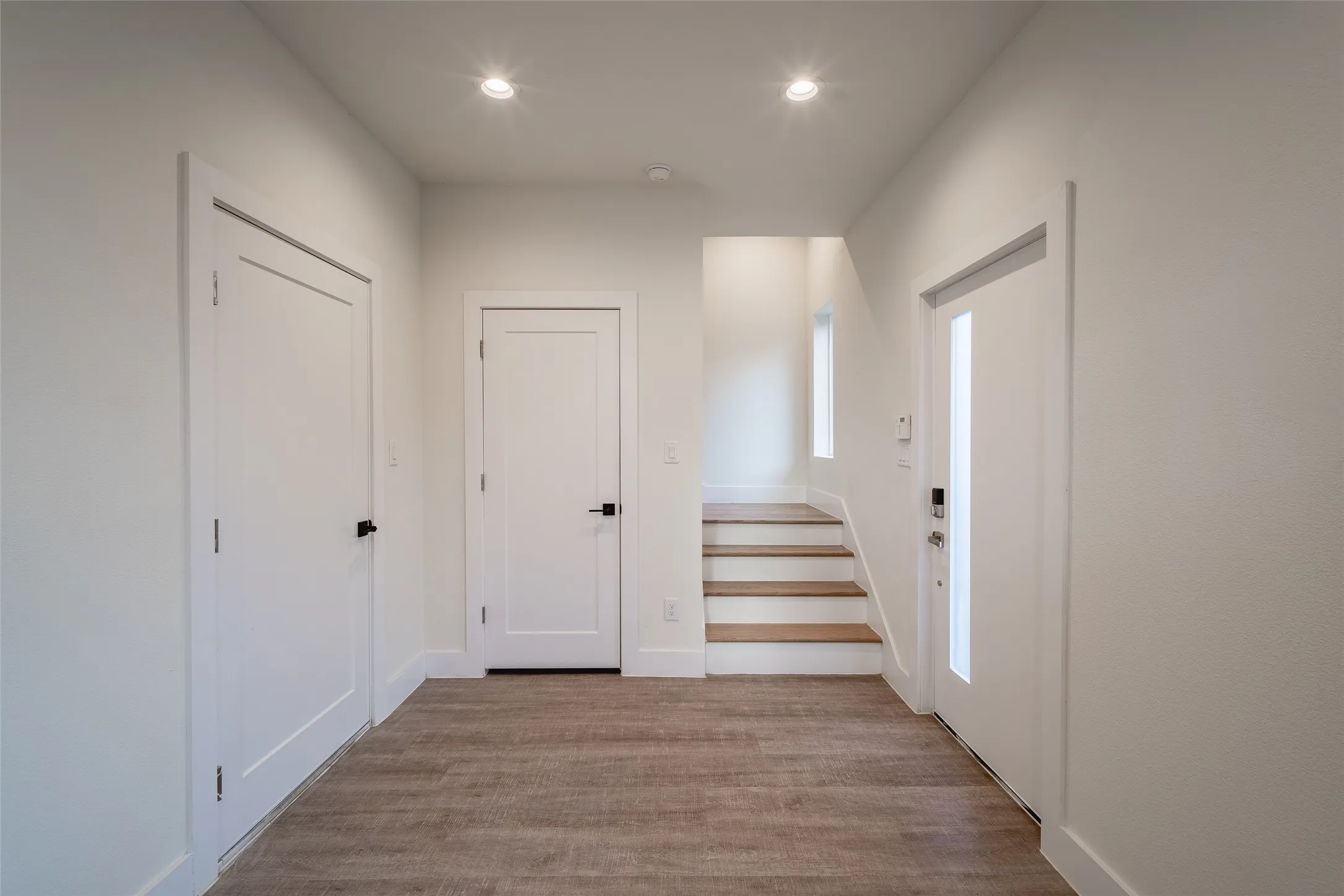  Room with light hardwood / wood-style flooring and ceiling fan