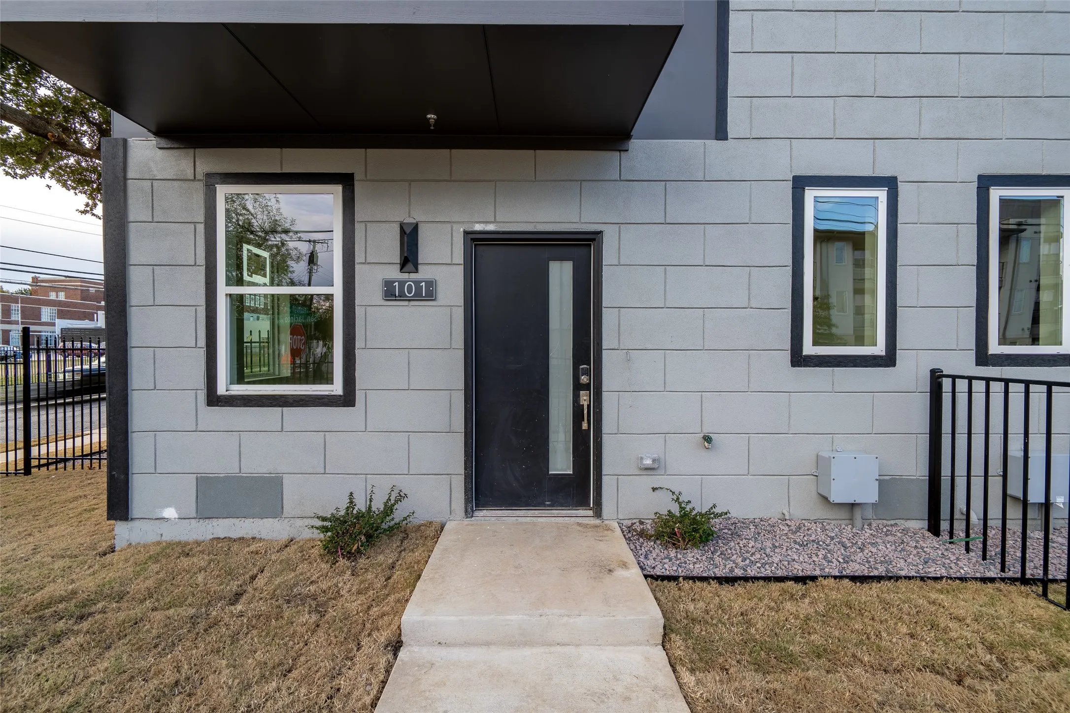 Doorway to property featuring a yard