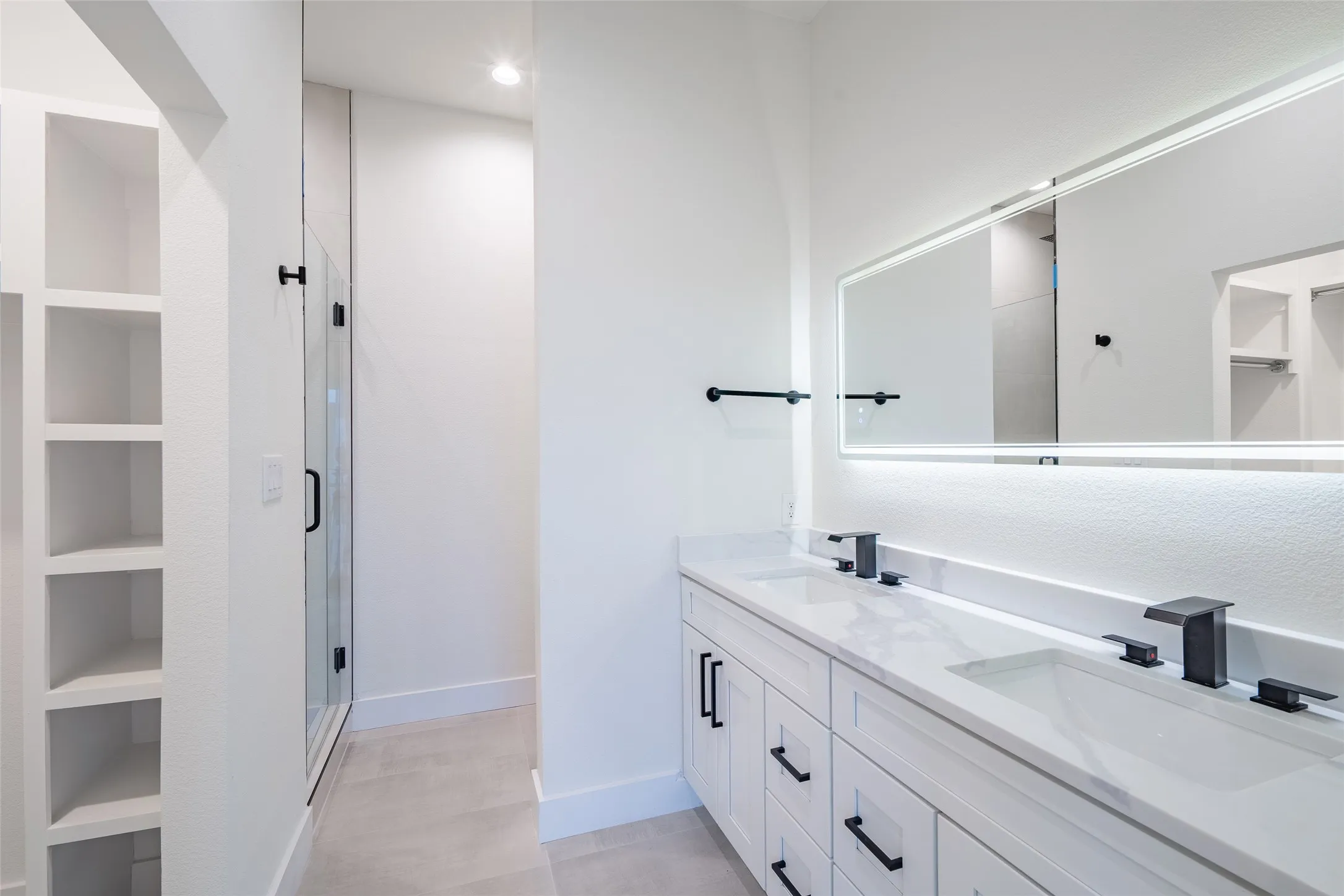 Bathroom with vanity and walk in shower