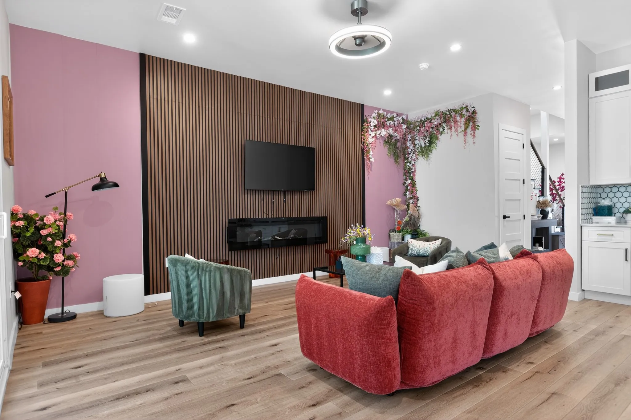 Wood-finish flooring, recessed lighting, and a modern ceiling fan