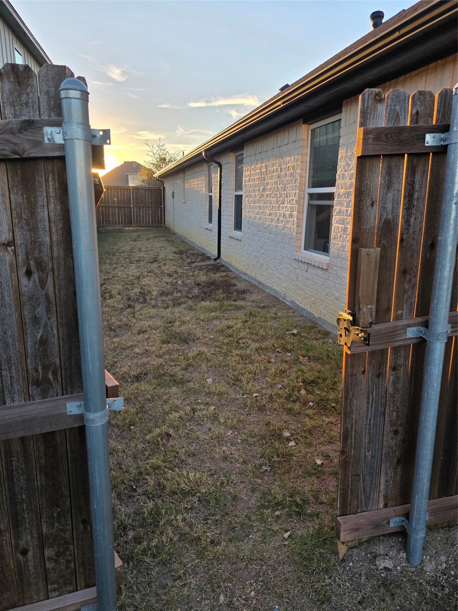 View of yard at dusk