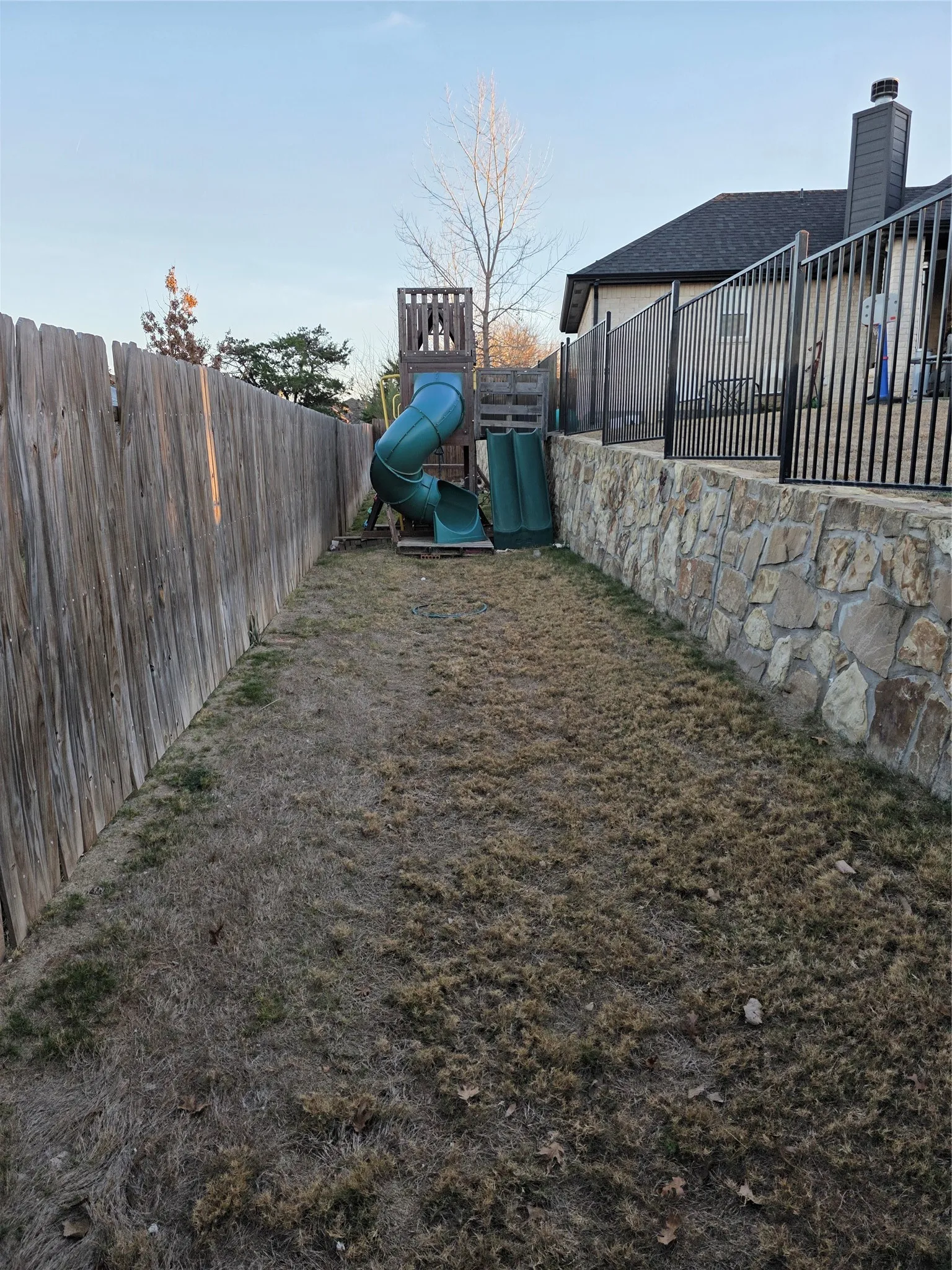 View of yard with a playground