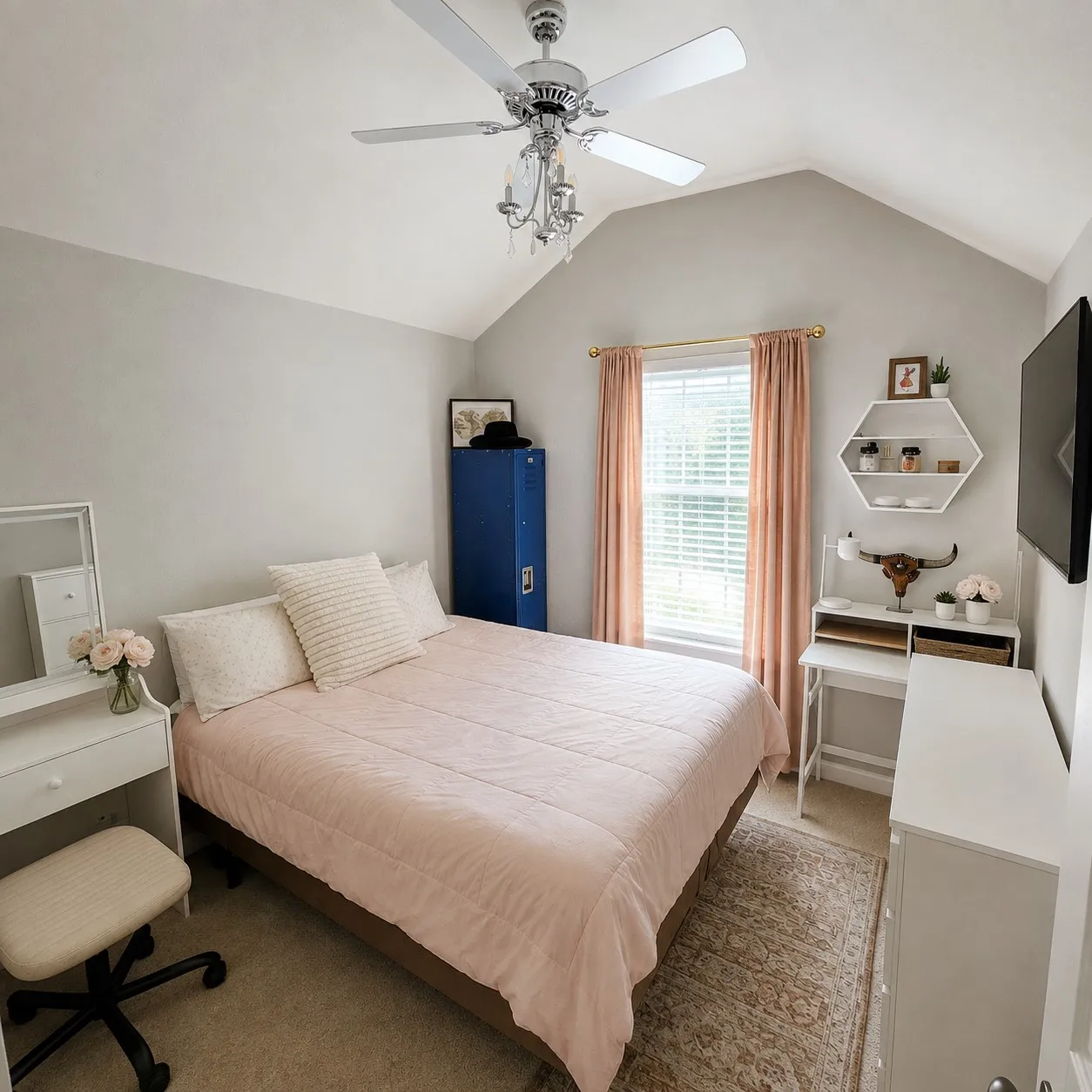 Vaulted ceiling with an attached ceiling fan and chandelier fixture