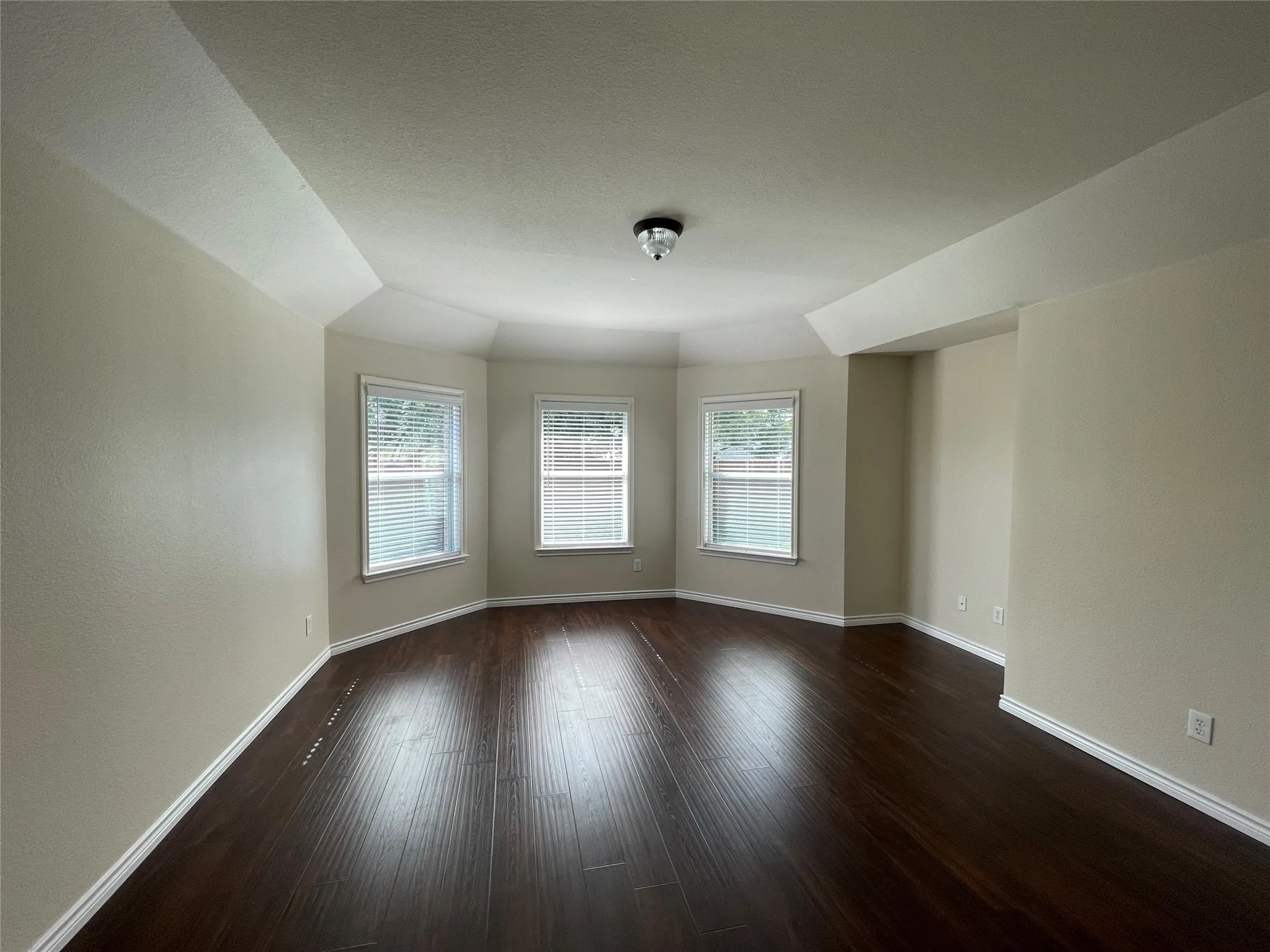 Unfurnished room featuring wood-type flooring