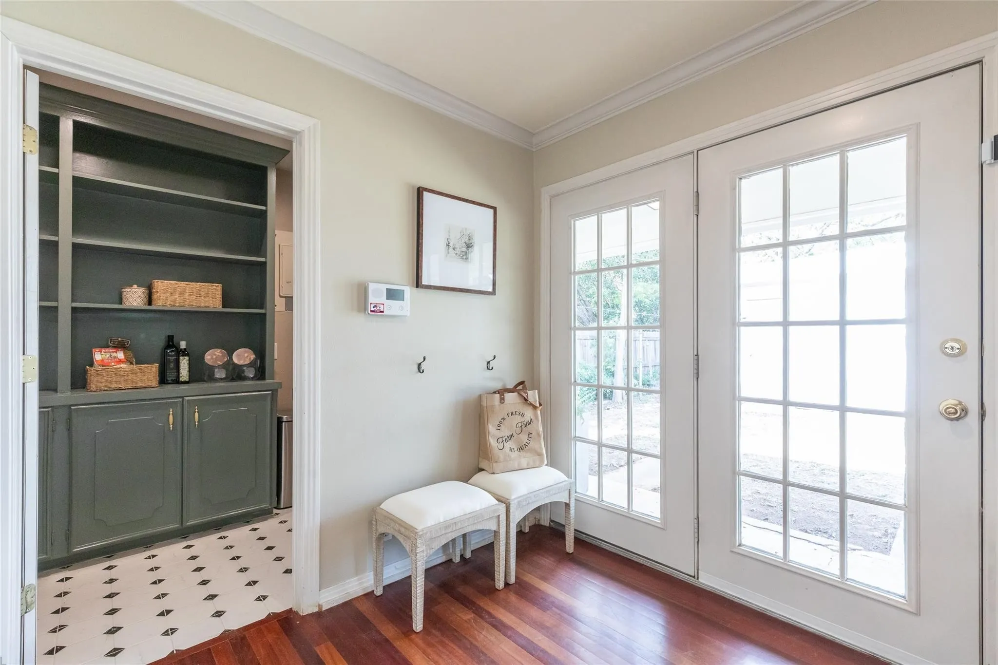 view to the utility room with walk-in pantry
