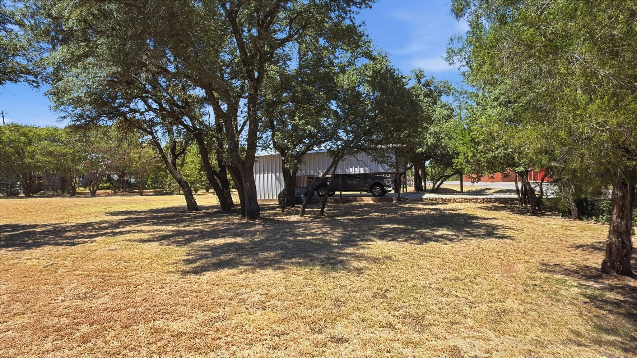 Carport/garage is on a corner lot.