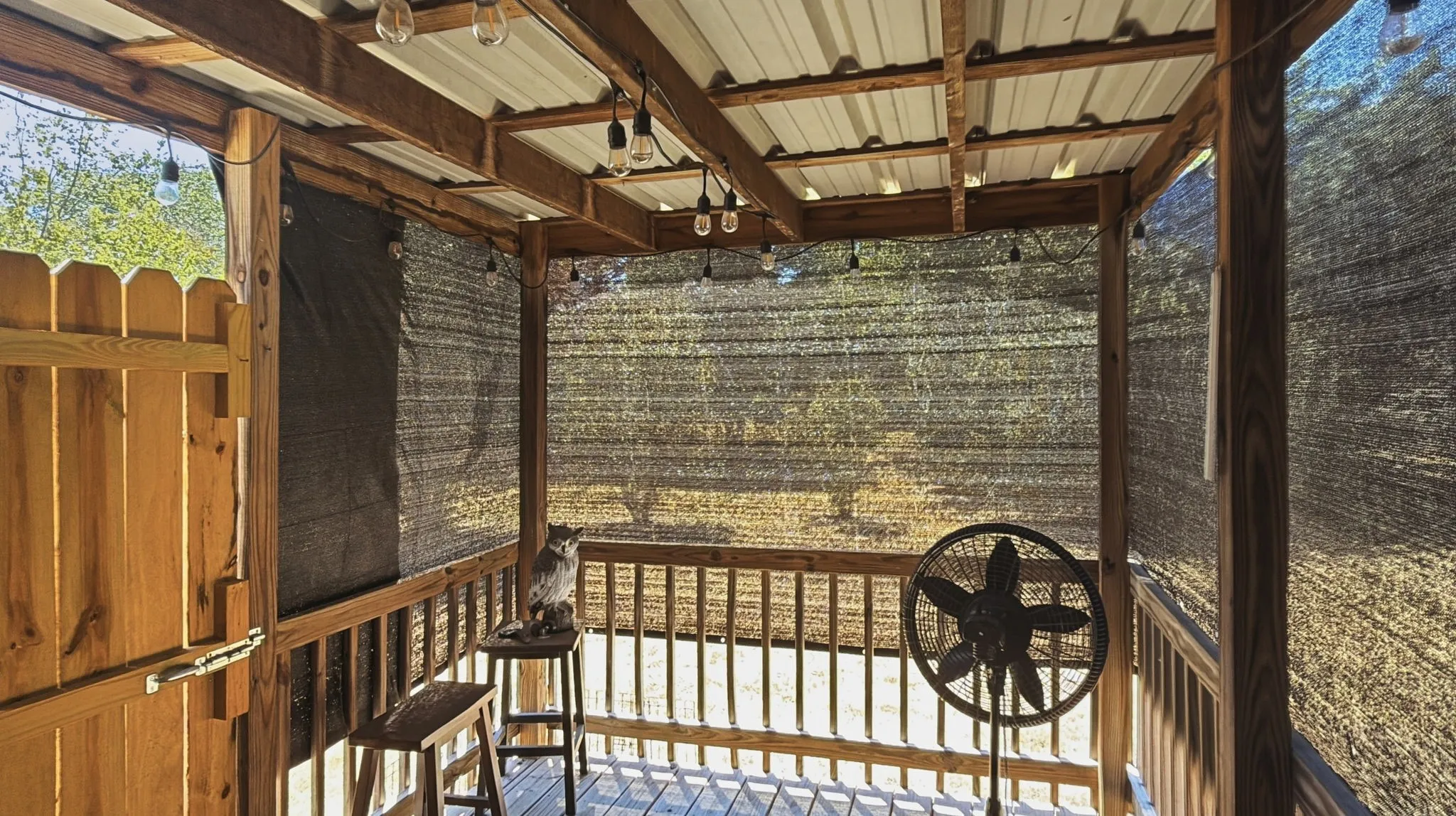 Covered and screened back deck off bedroom 3