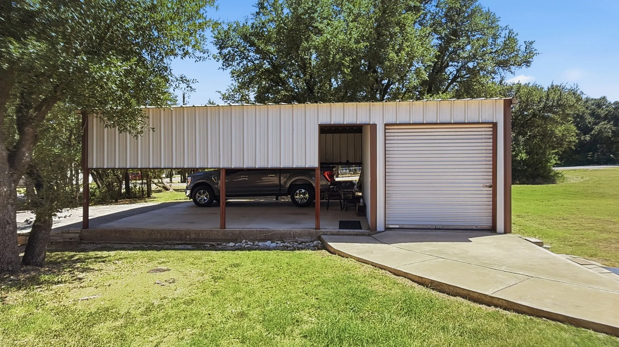 Side view of 2 car carport and garage