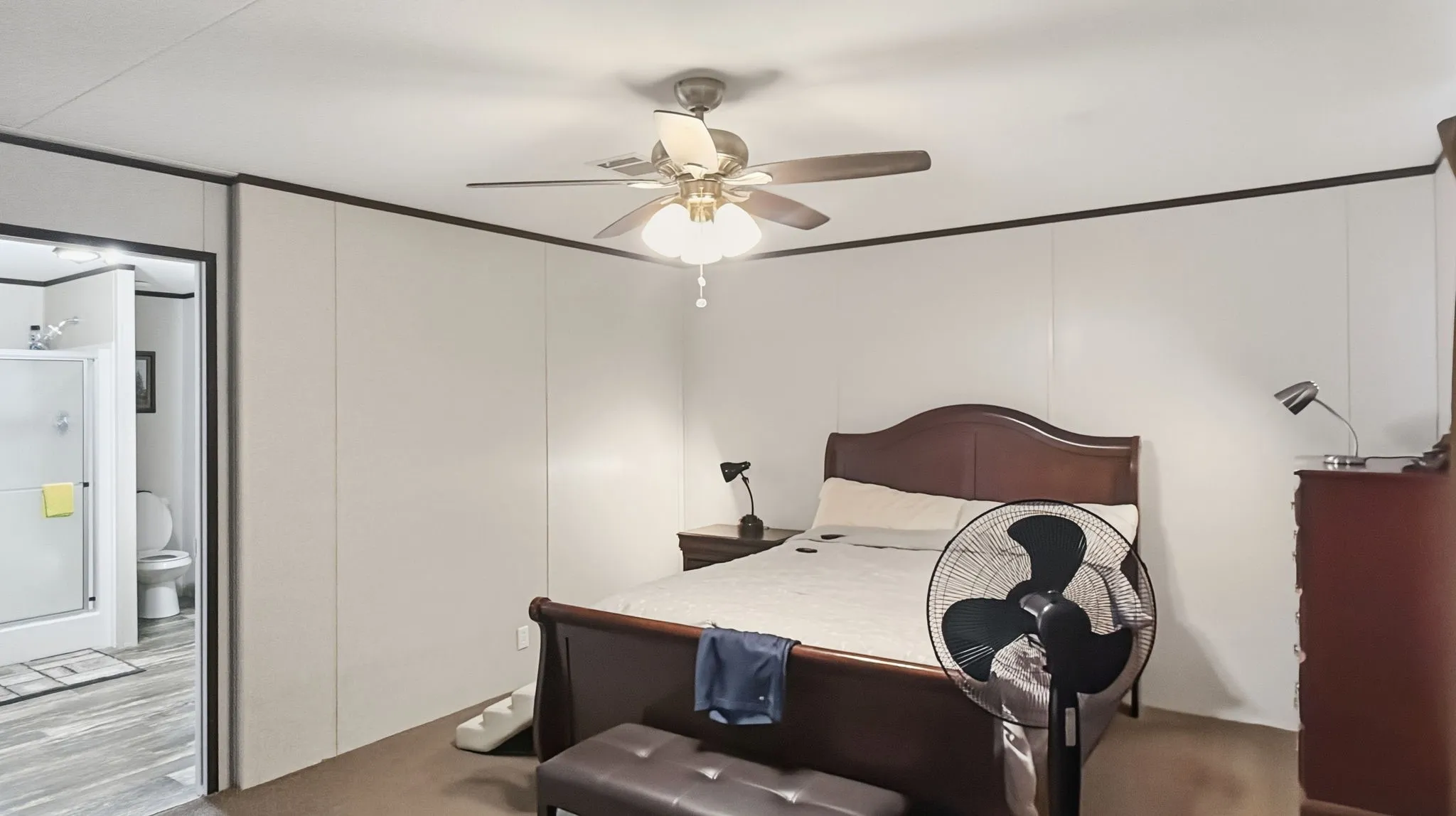 Primary bedroom with primary bath on left