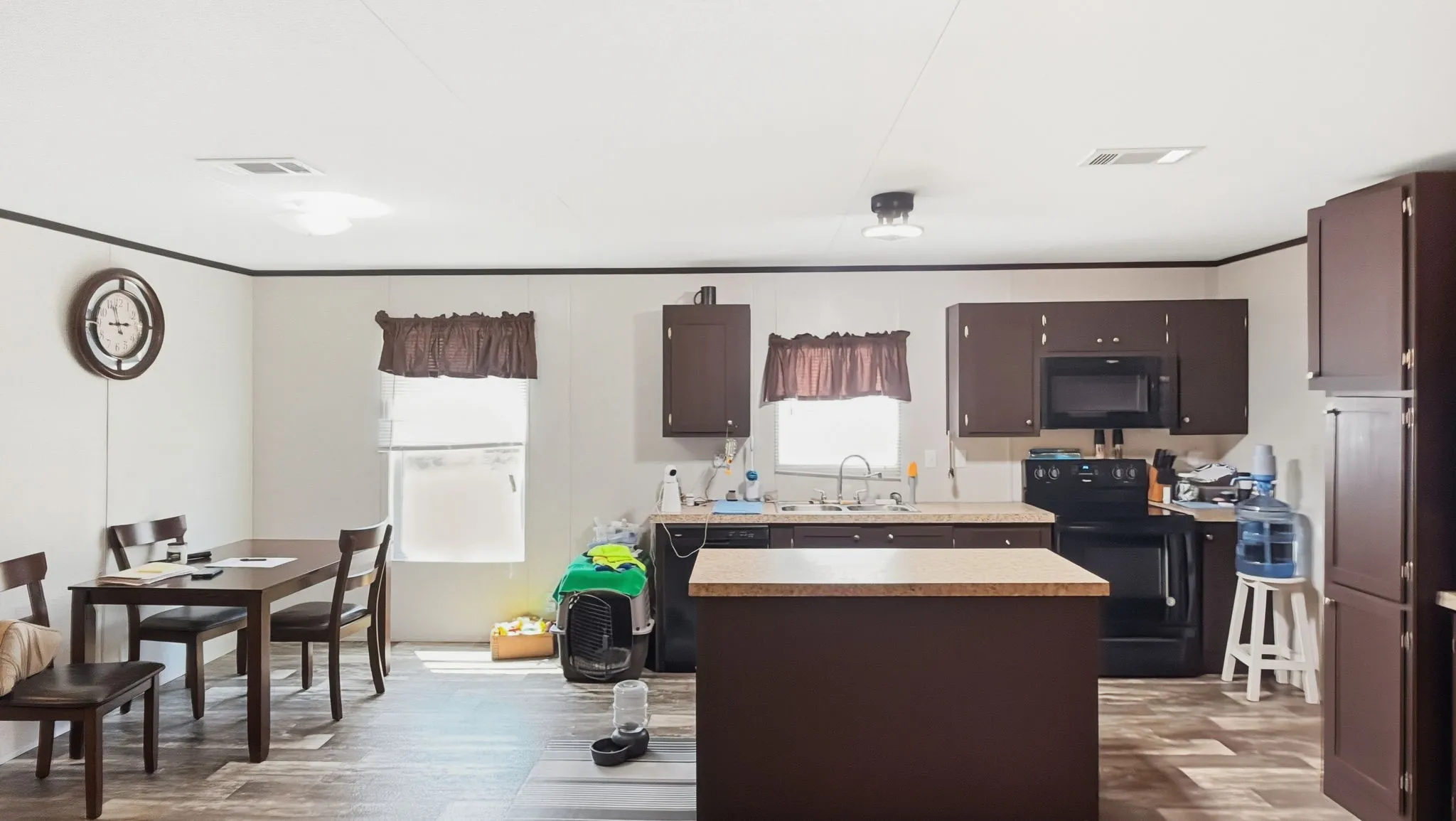 Open kitchen with island and breakfast area