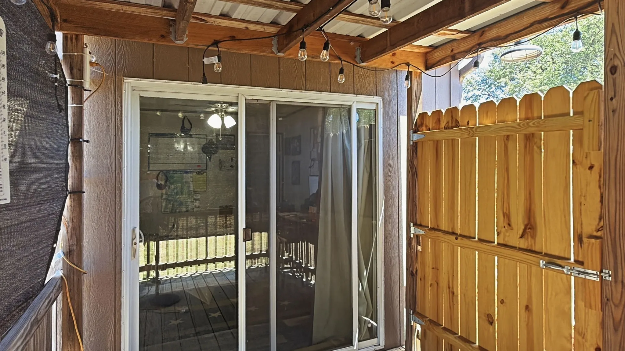 Covered deck with sliding door to bedroom 3