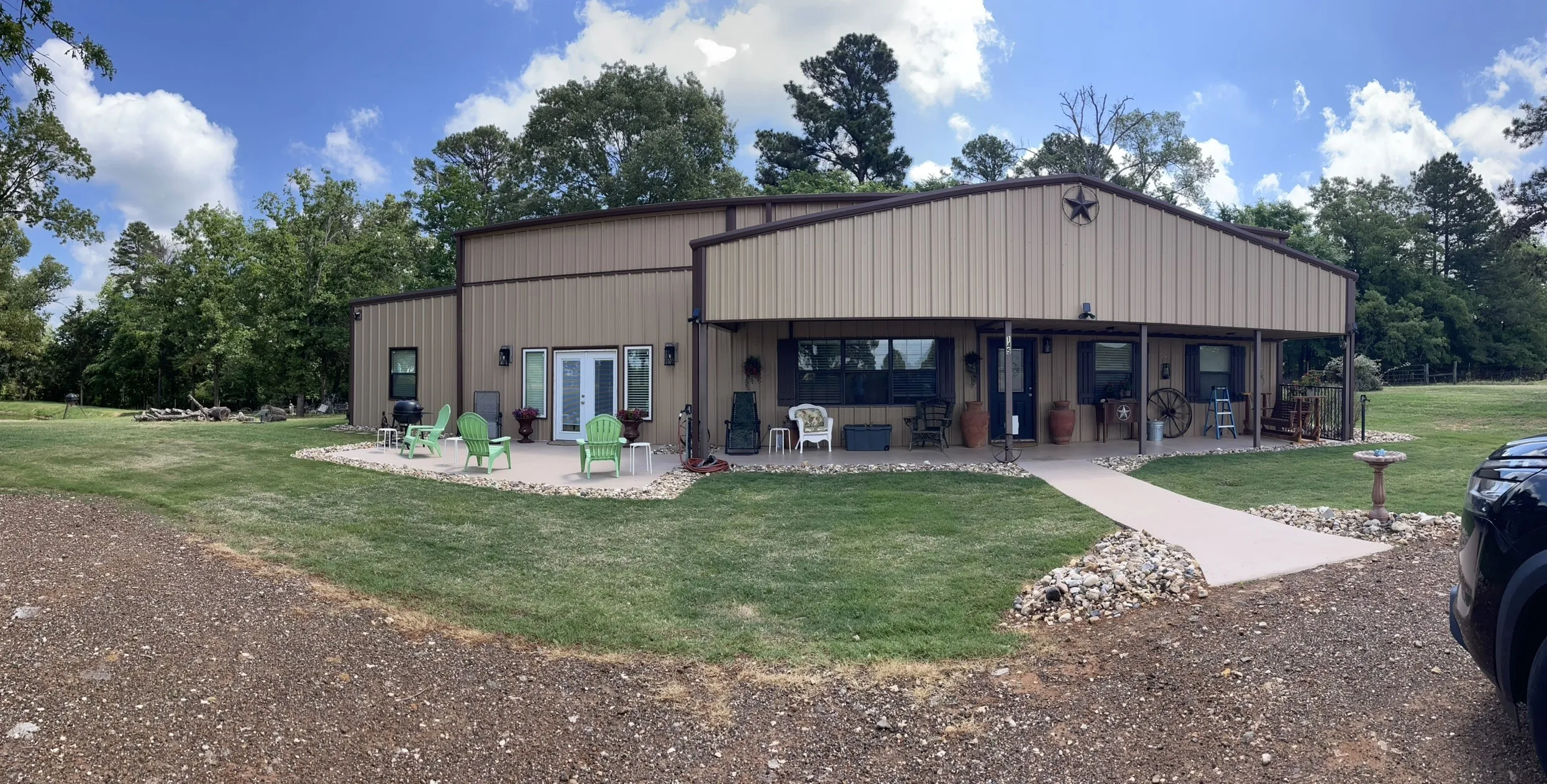 Metal-sided exterior with covered porch