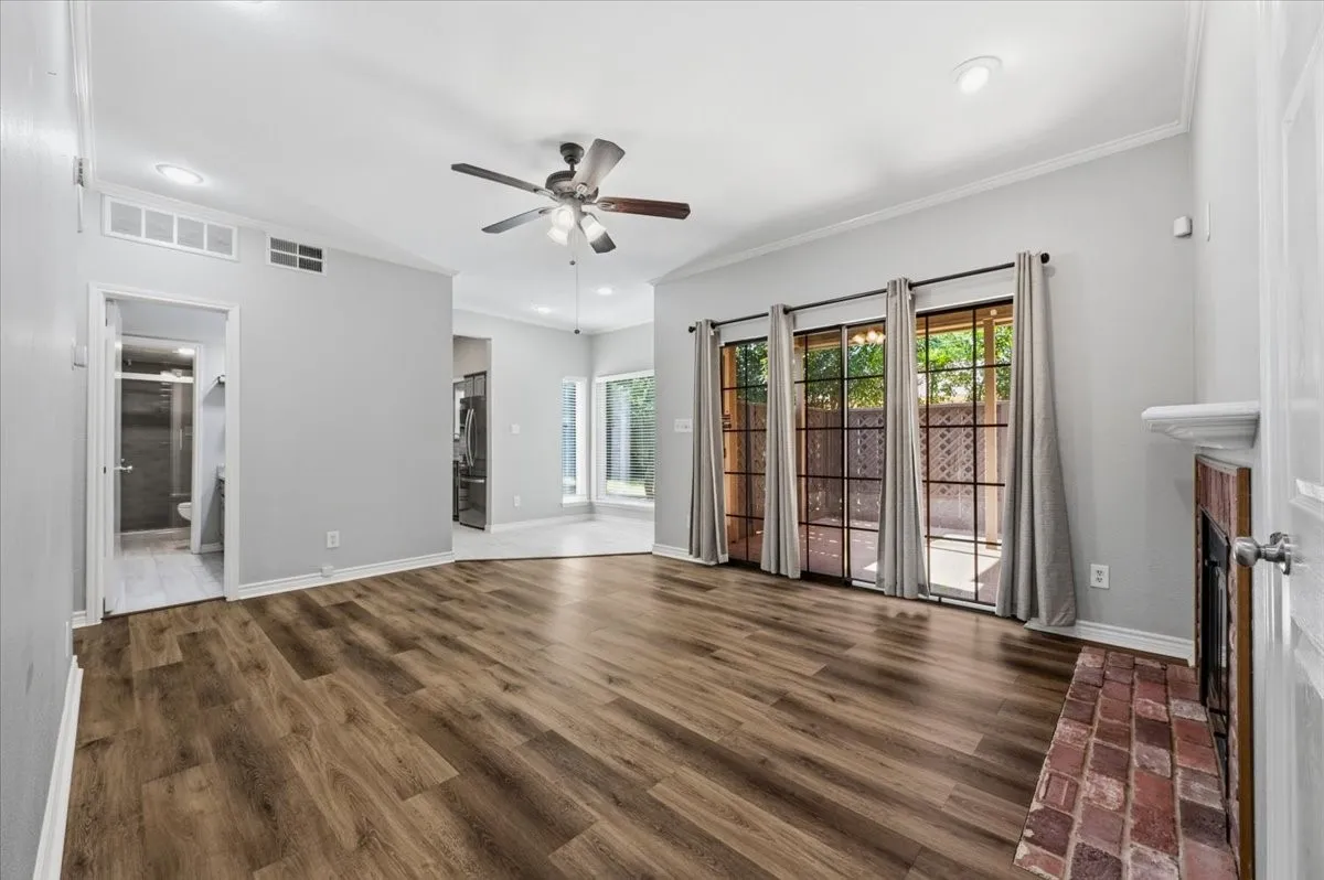 Spacious living area, with sliding French doors leading to the large patio. See the convenient layout of this space!