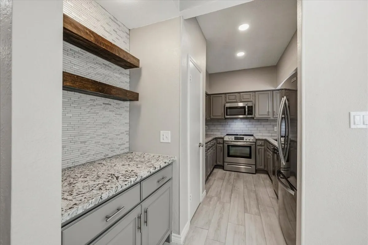 View of coffee bar leading to kitchen.