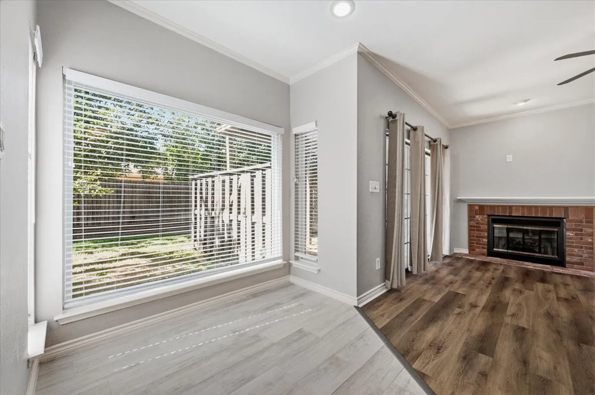 Bright sunny windows enhance your dining area, and open living space.