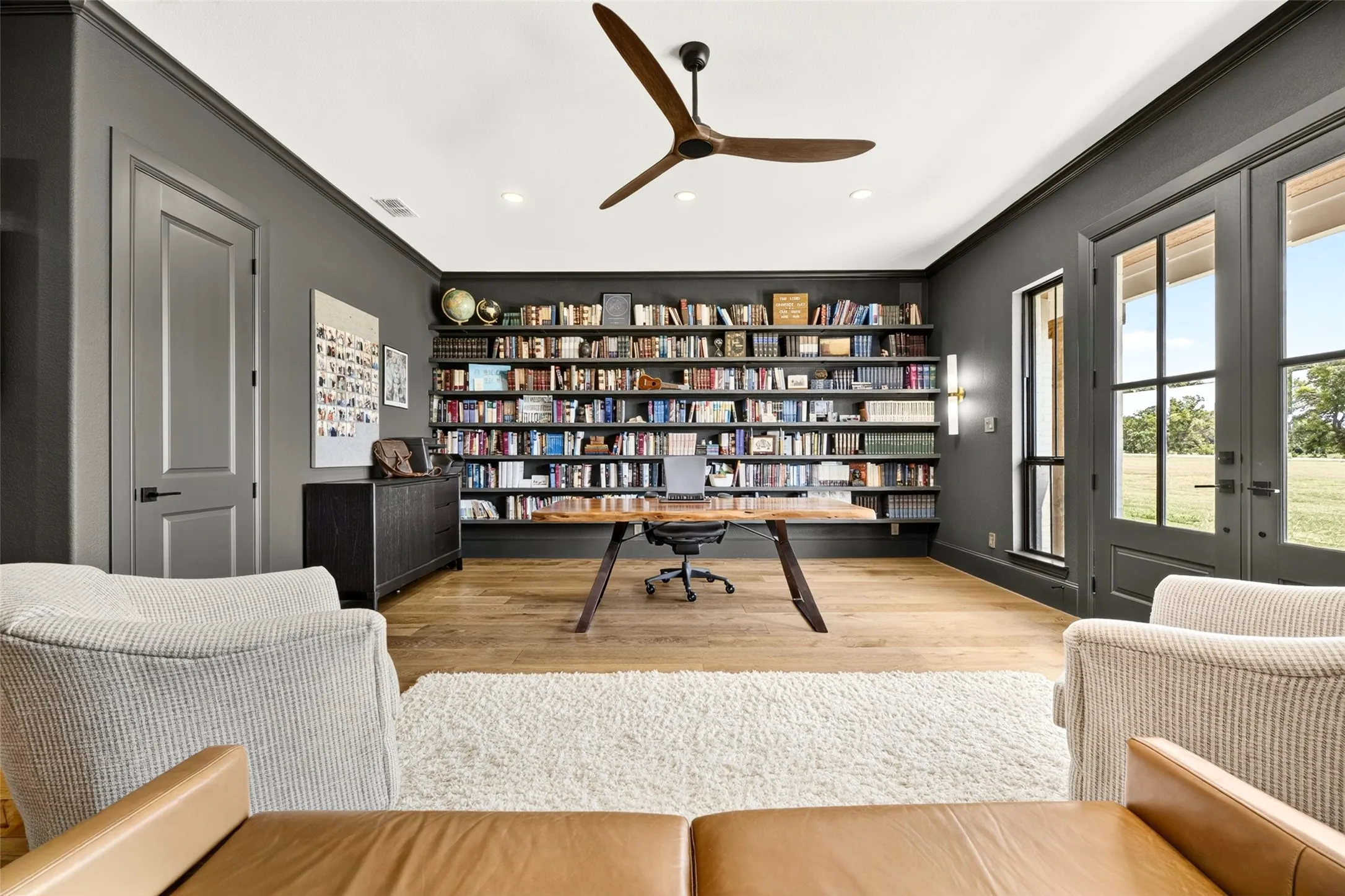 Wood-finish flooring with a decorative area rug