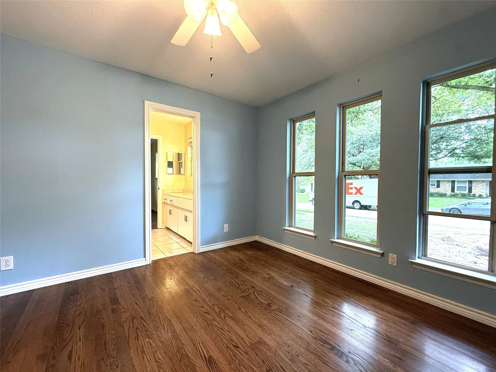 The first bedroom opens to a bath shared by the second bedroom in southeast corner of the house