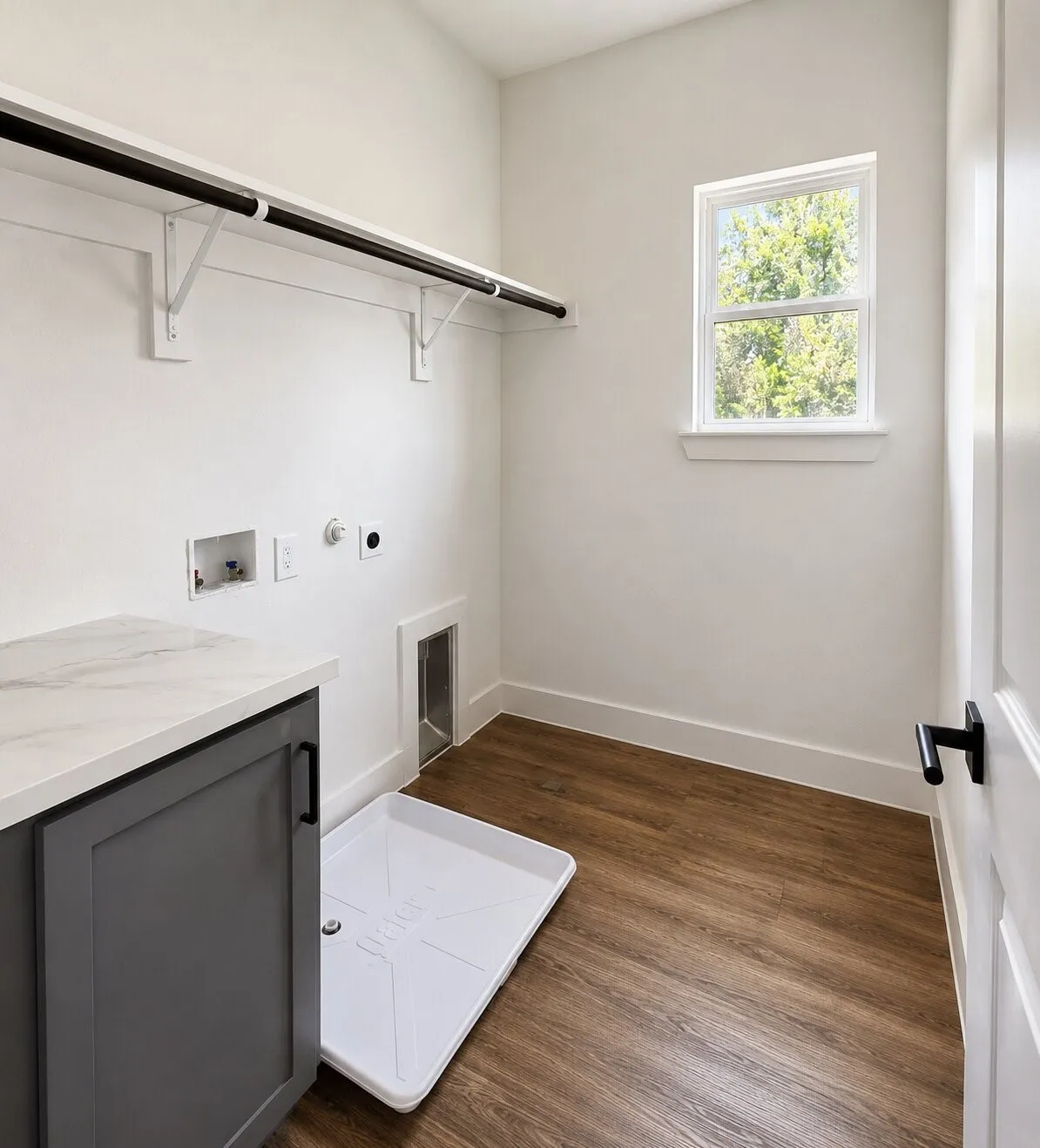 Wood-finish flooring with crisp white walls