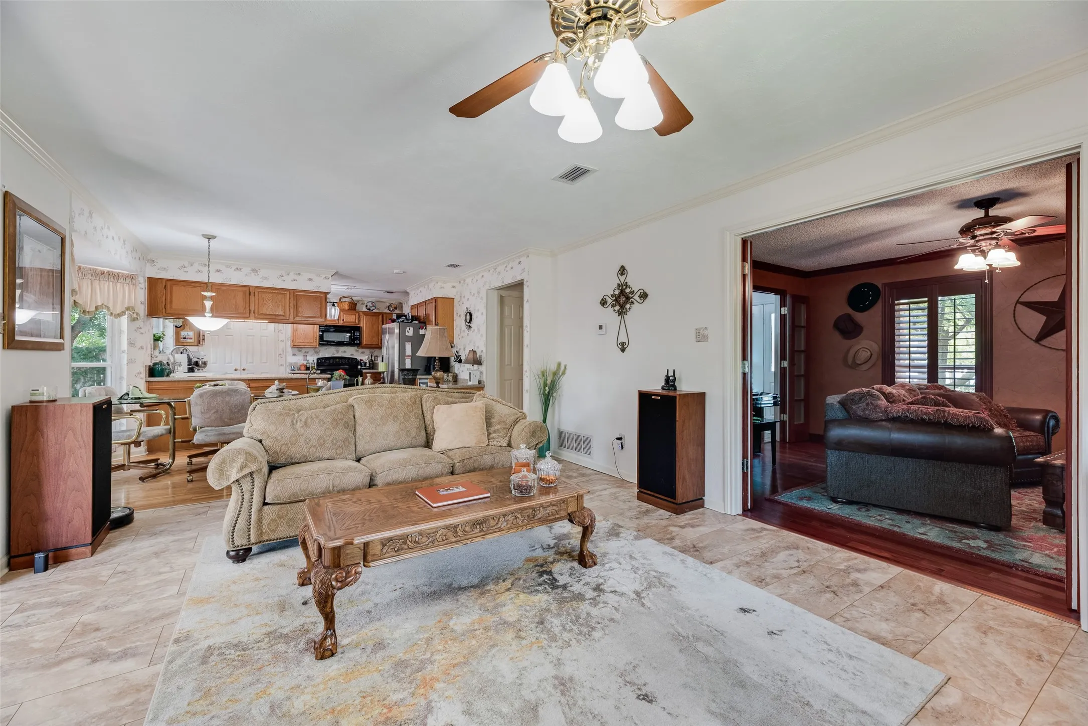 Open-concept layout with tile flooring