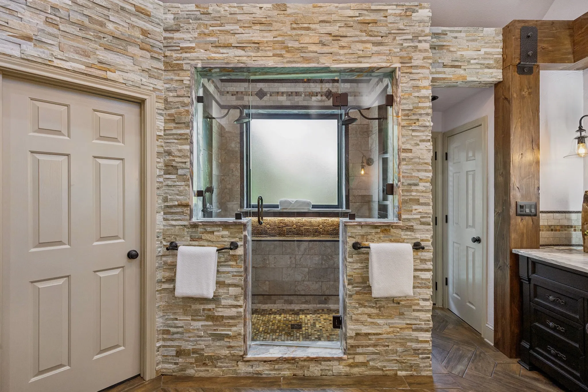 Spa-inspired primary bath with designer finishes.