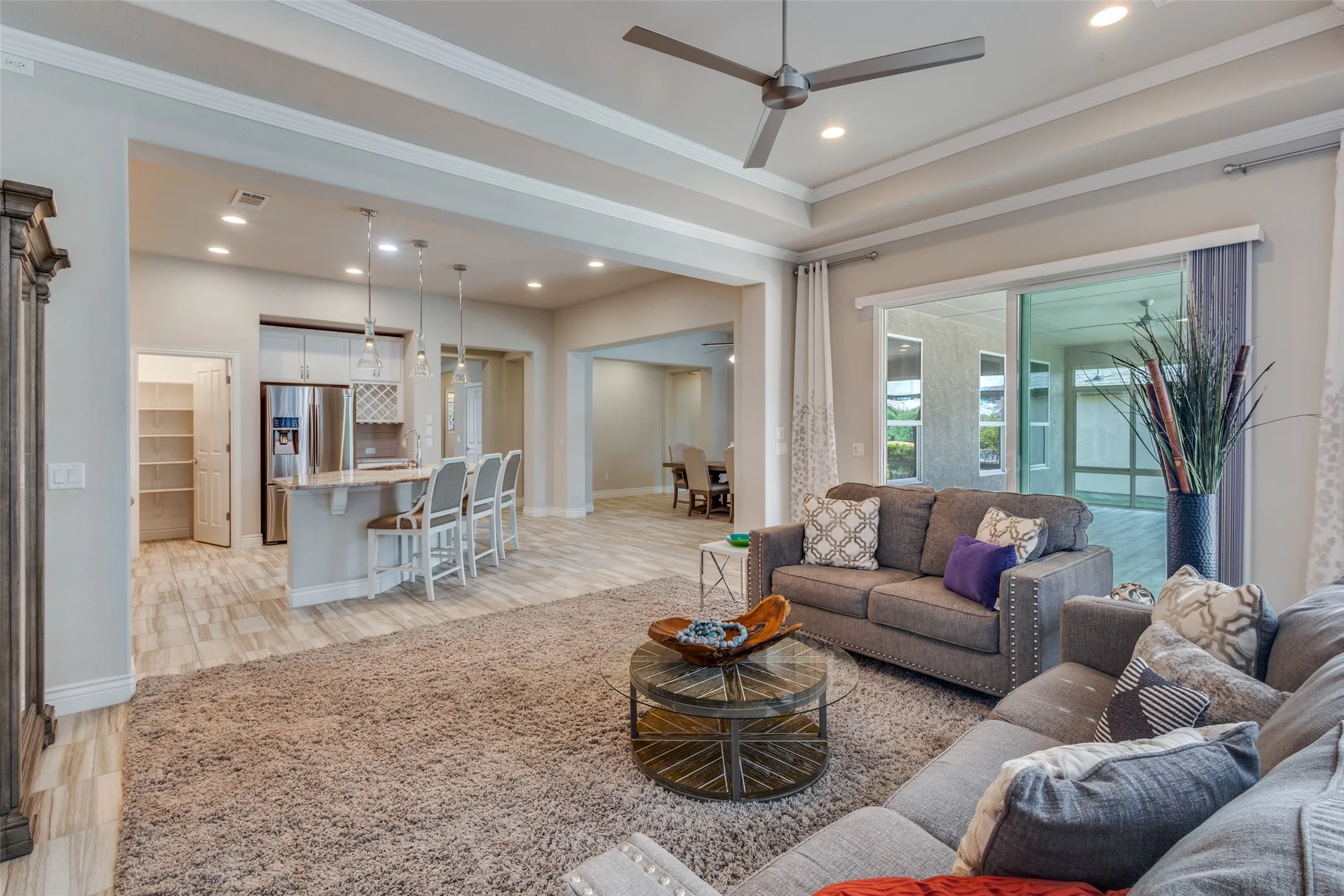 LOOK AT THE FLOW OF THE SPACE. EASY ACCESS TO 3RD LIVING AREA. CROWN MOLDINGS TOO.