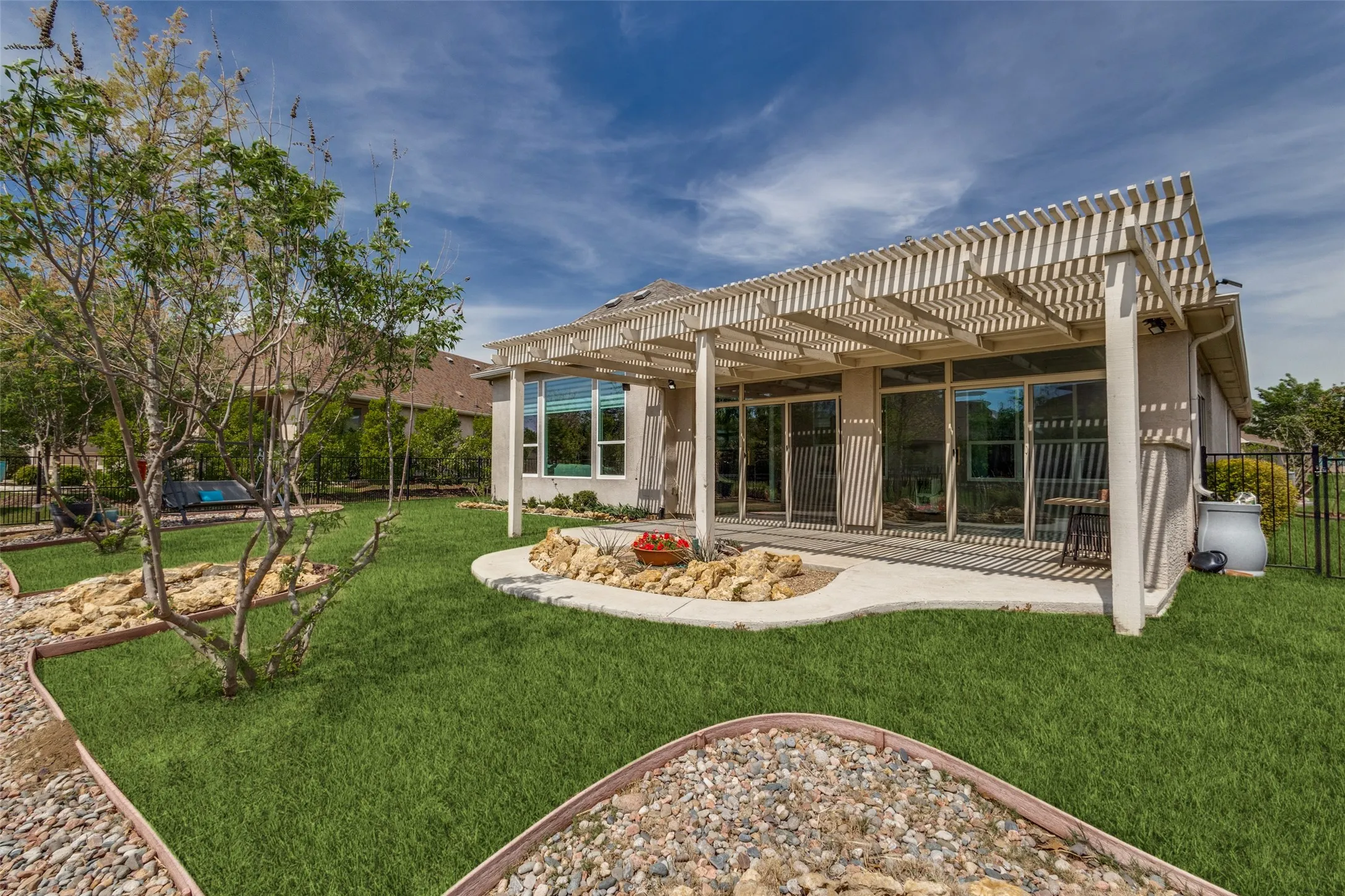 READY TO ENJOY THIS FENCED YARD?