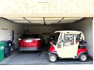 TWO CARS AND A GOLF CART SHOWN IN THIS PHOTO.
RUBBER FLOORING ADDED AS WELL.