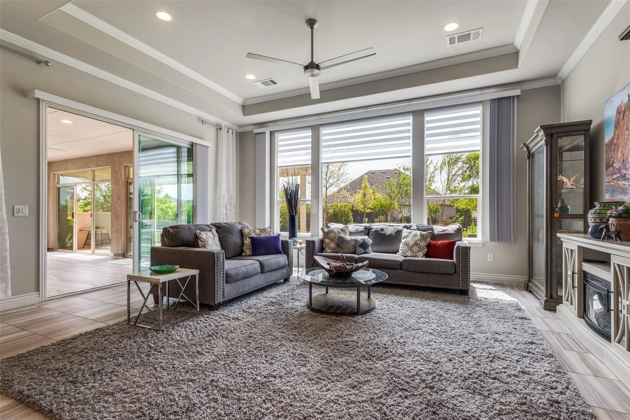 HIGH CEILINGS, ABUNDANT NATURAL LIGHT, CUSTOM WINDOW COVERINGS. OPEN FLOOR PLAN.