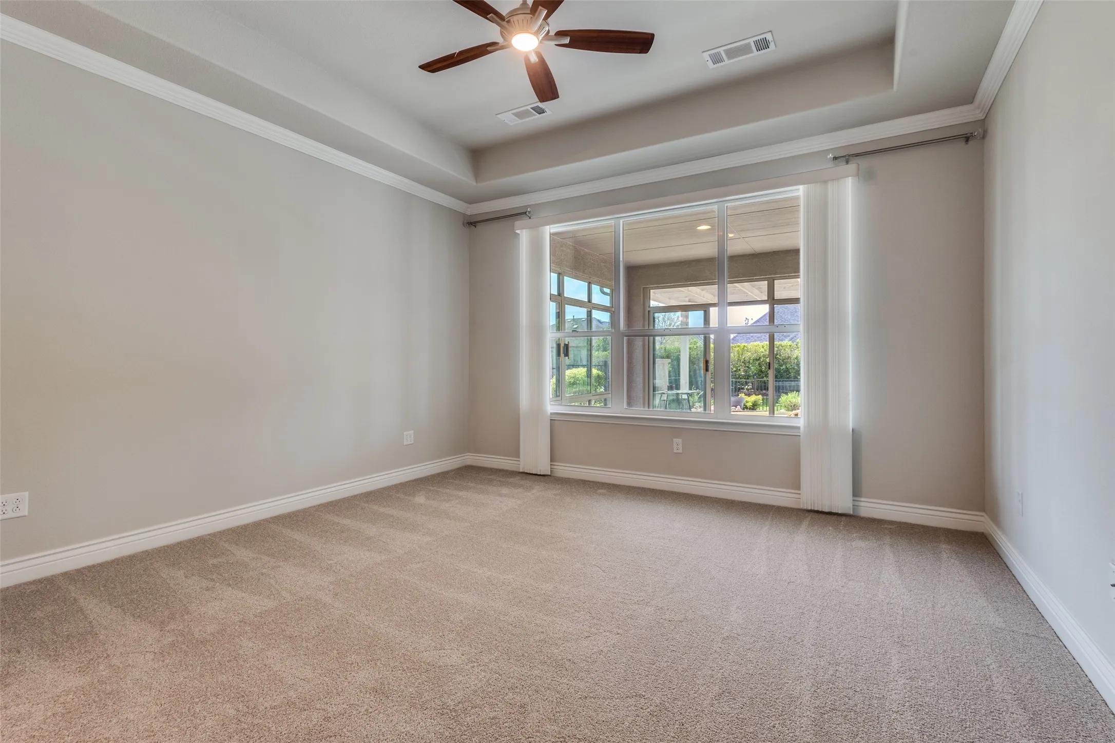 YOU WILL SEE IT LIKE THIS WITH NEW PAINT, NEW CARPET, CEILING FAN AND CUSTOM WINDOW COVERINGS.