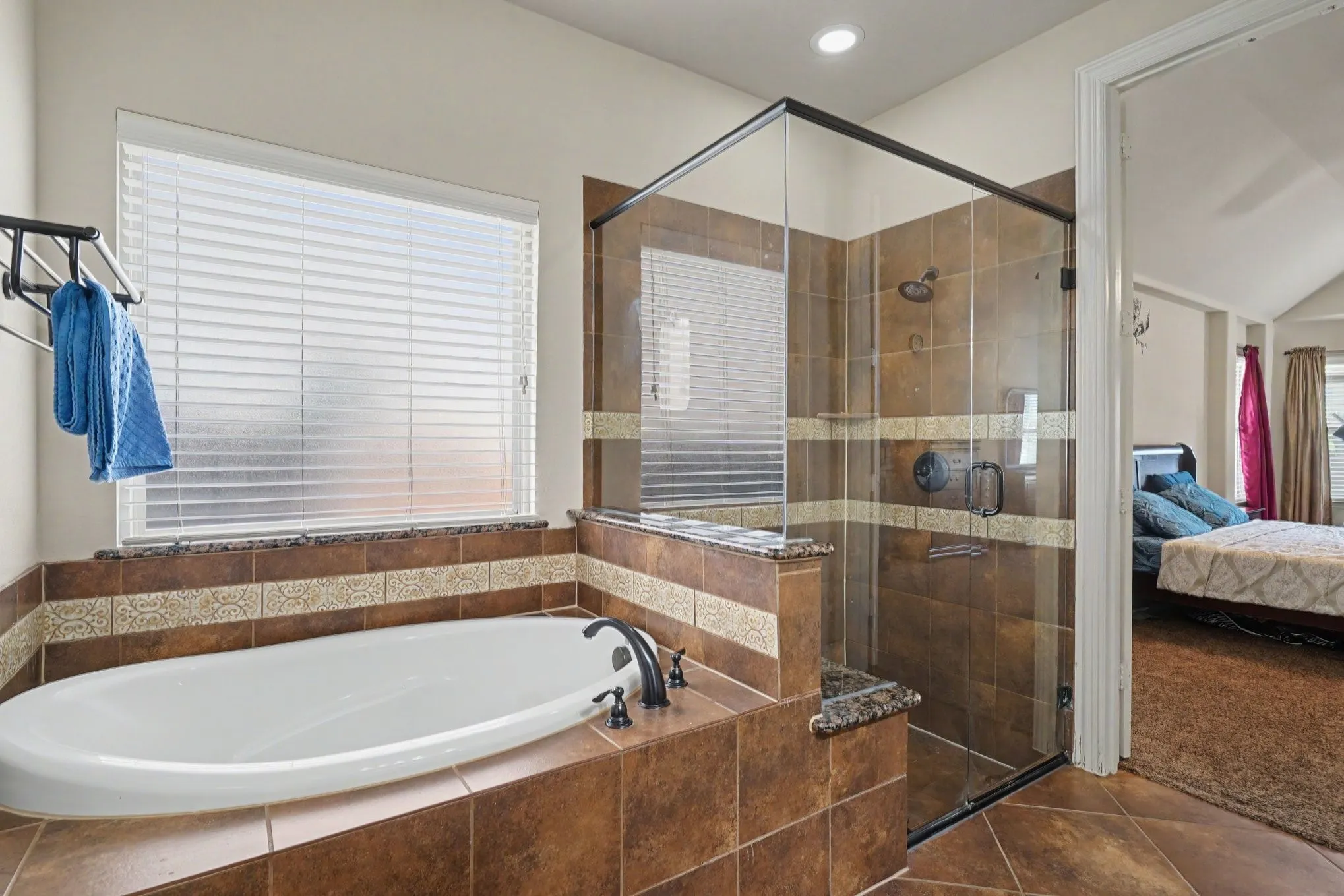 Soaking tub with oil-rubbed bronze fixtures