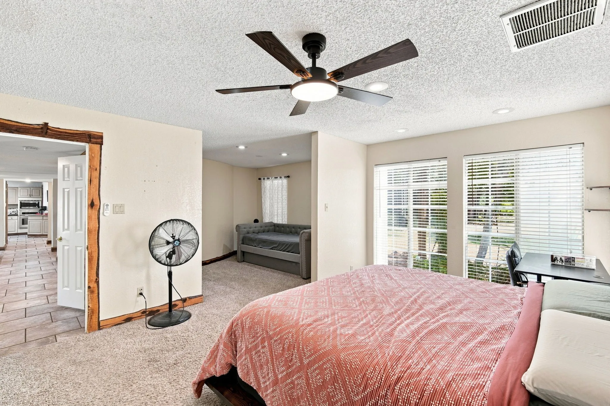Second primary bedroom showing adjoining sitting area