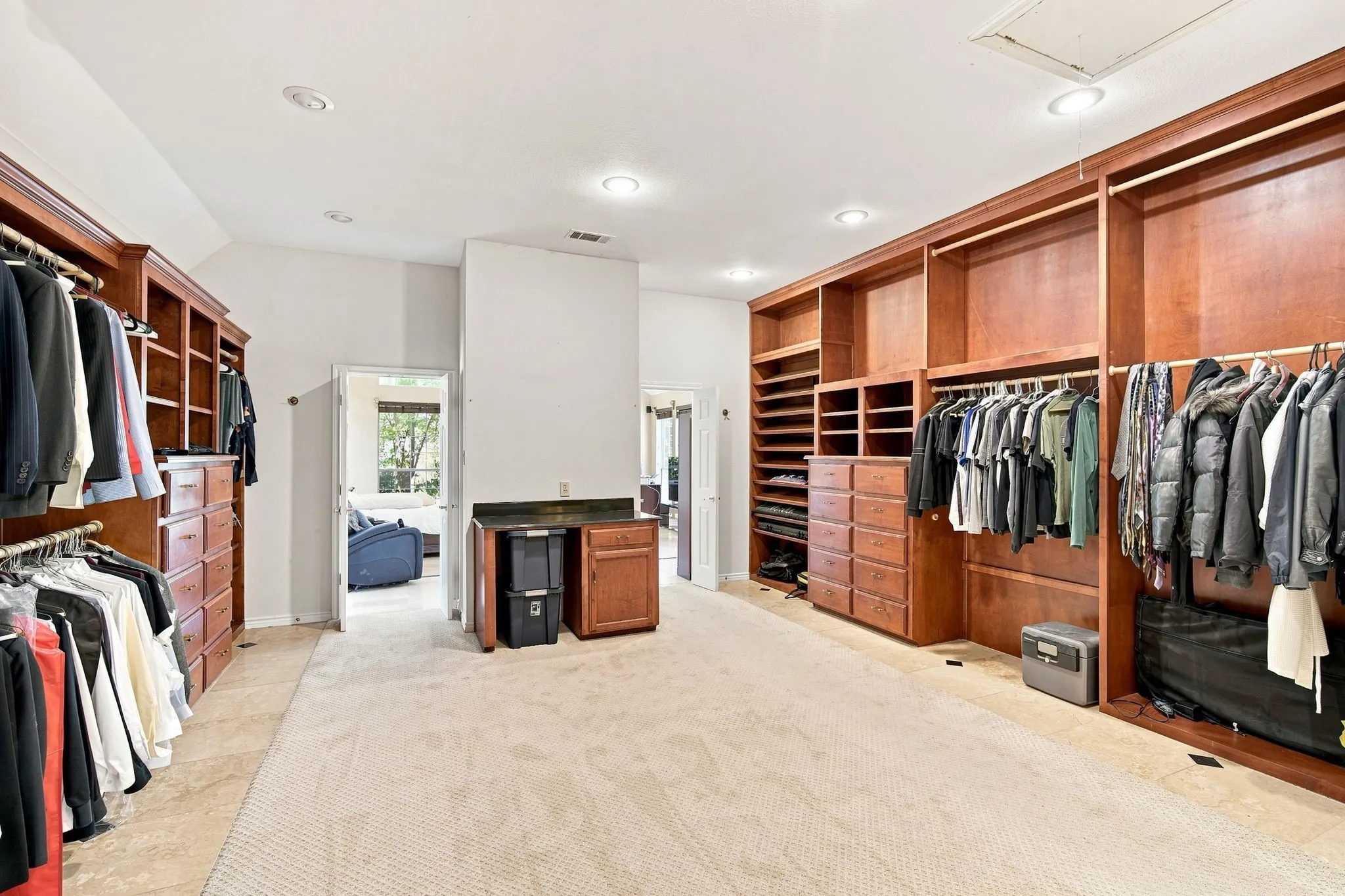 Expansive custom walk through closet/dressing room