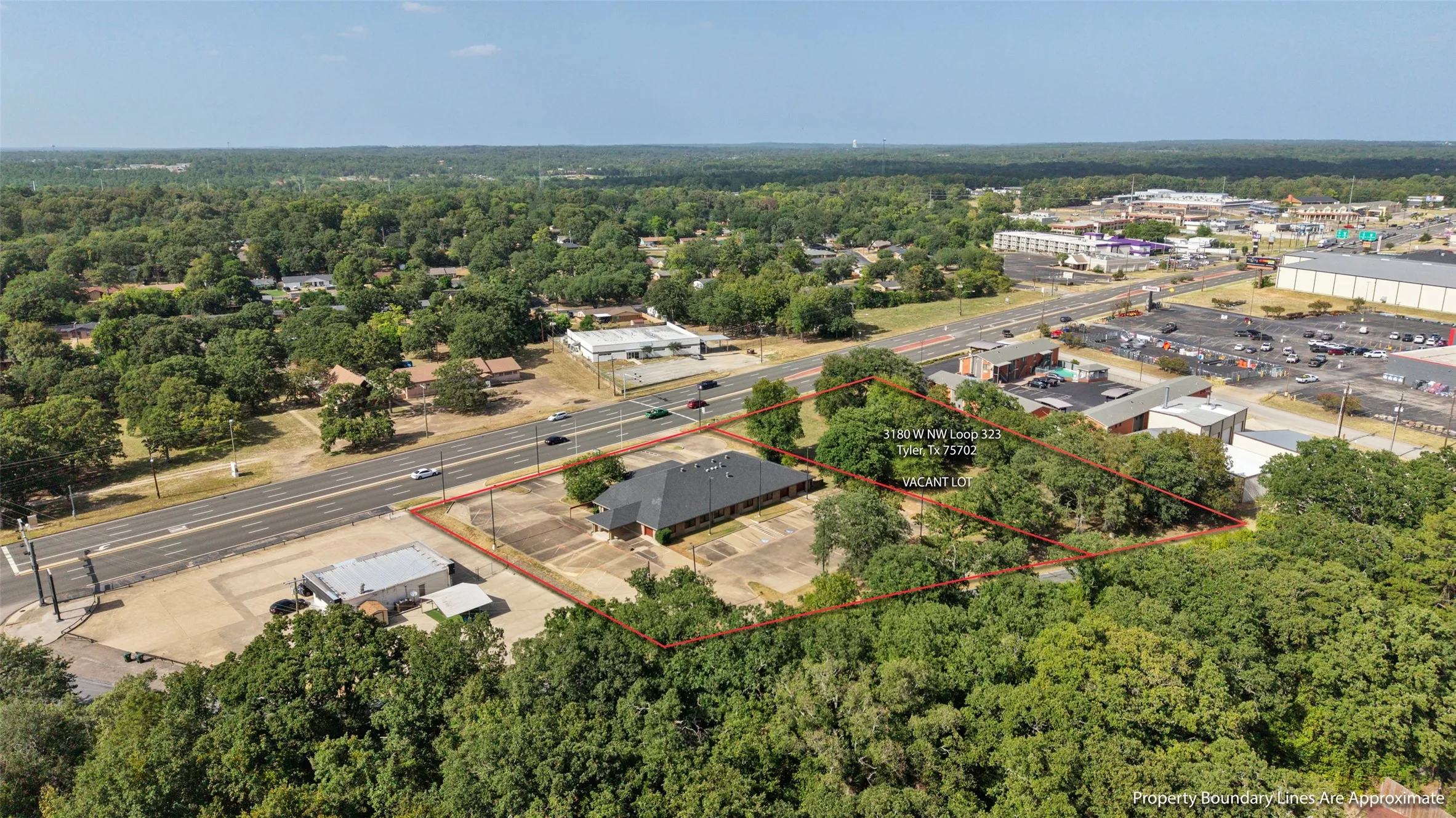 Opportunity to expand! 3180 W NW LOOP 323 TYLER Adjacent 1.01-acre commercial lot available SEPARATELY for $110,000. Lot is NOT included in the building’s listed price.