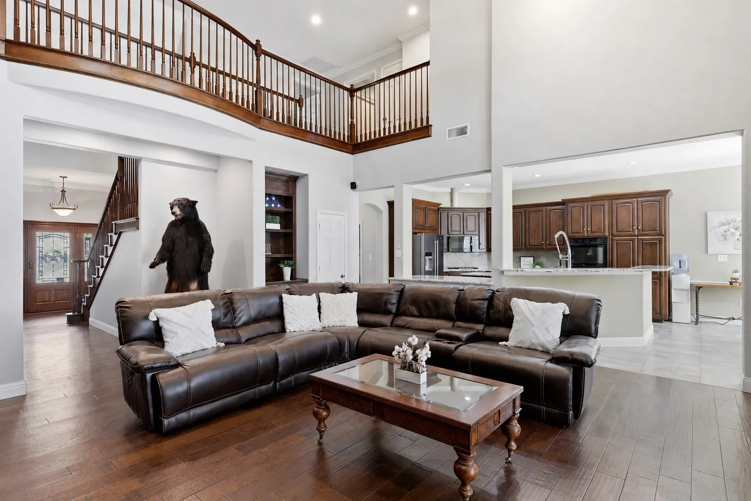 Tall ceilings give a grand feel with all of the comforts of home (Taxidermy removed using AI)