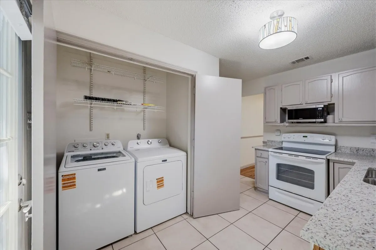 Utility Closet - Newer Maytag washer & dryer remain