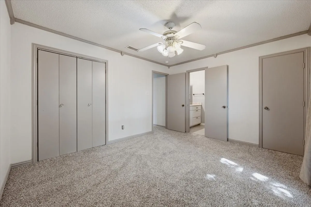 Primary bedroom with two closets