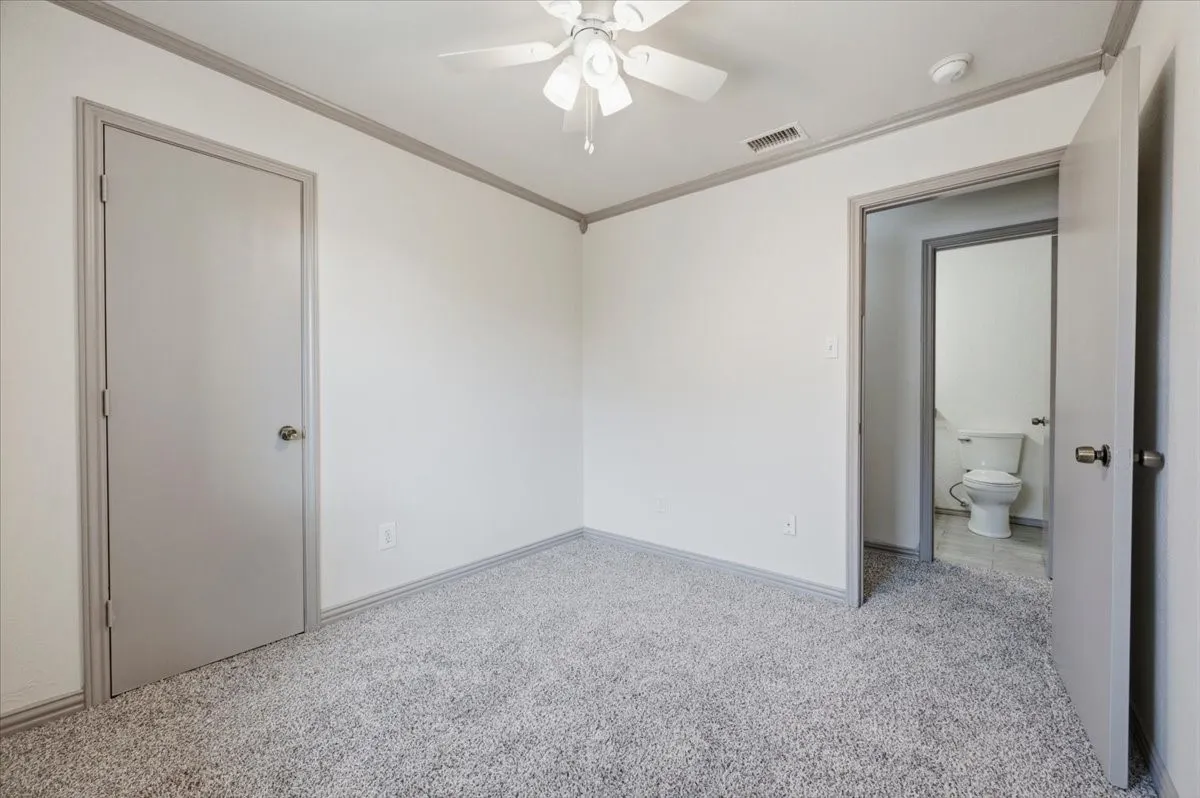 Bedroom 2 across from guest bath