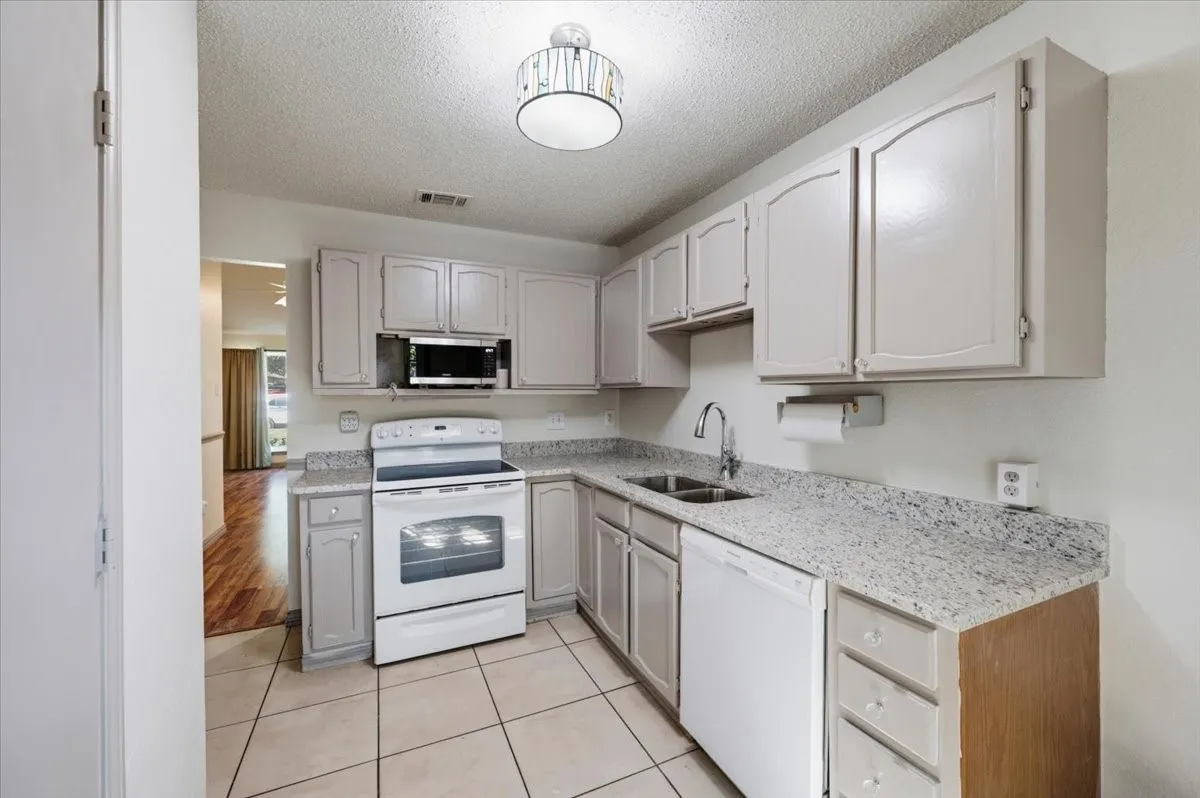 Kitchen cabinets painted August 2026