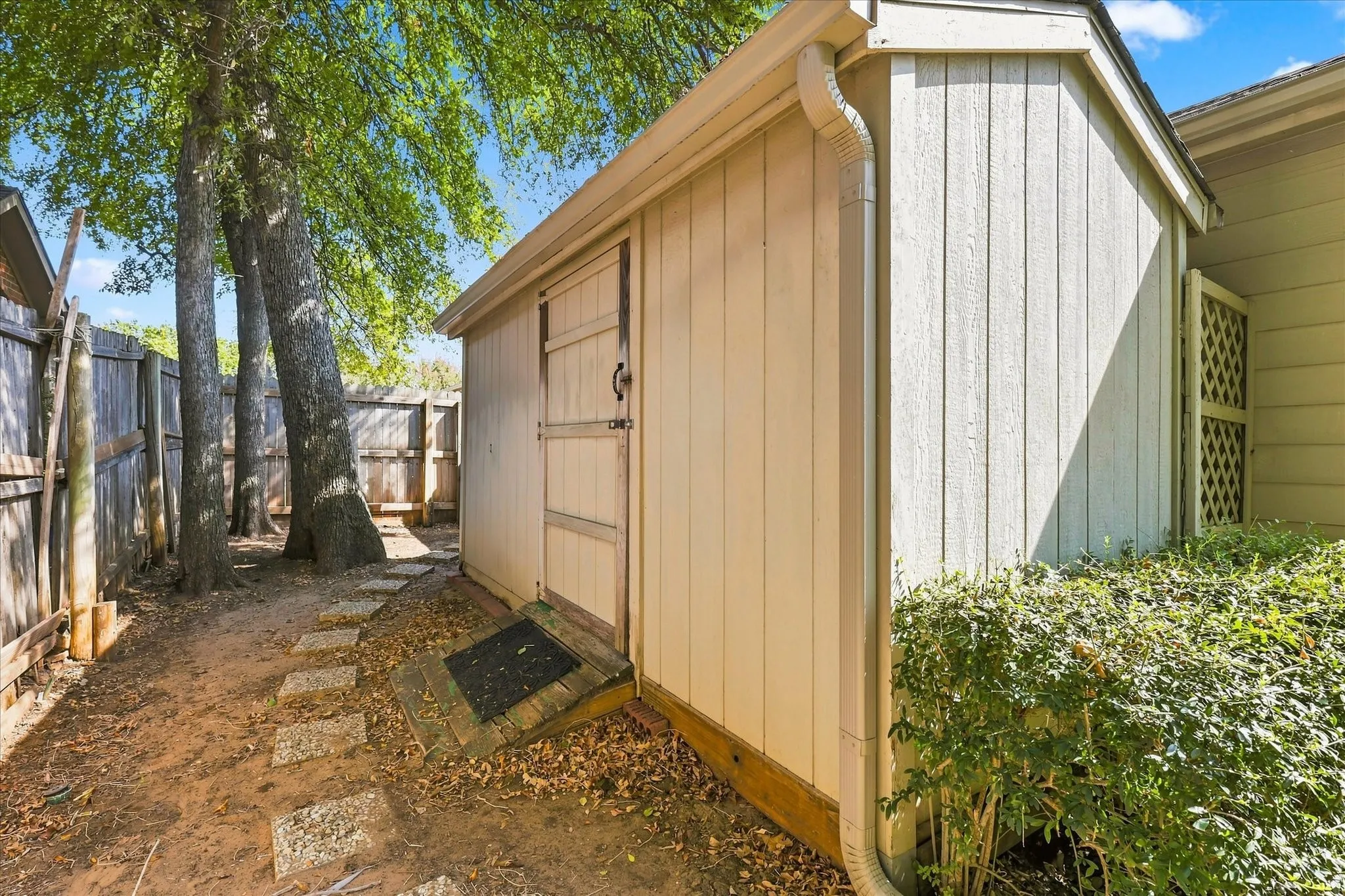 Storage shed on side yard