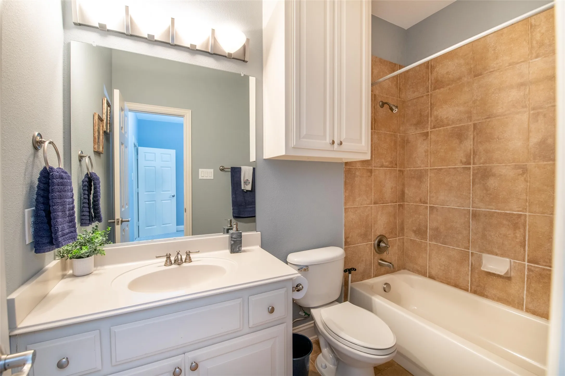 A second full bath provides convenient accommodations for family and guests with a practical, well-designed layout.
