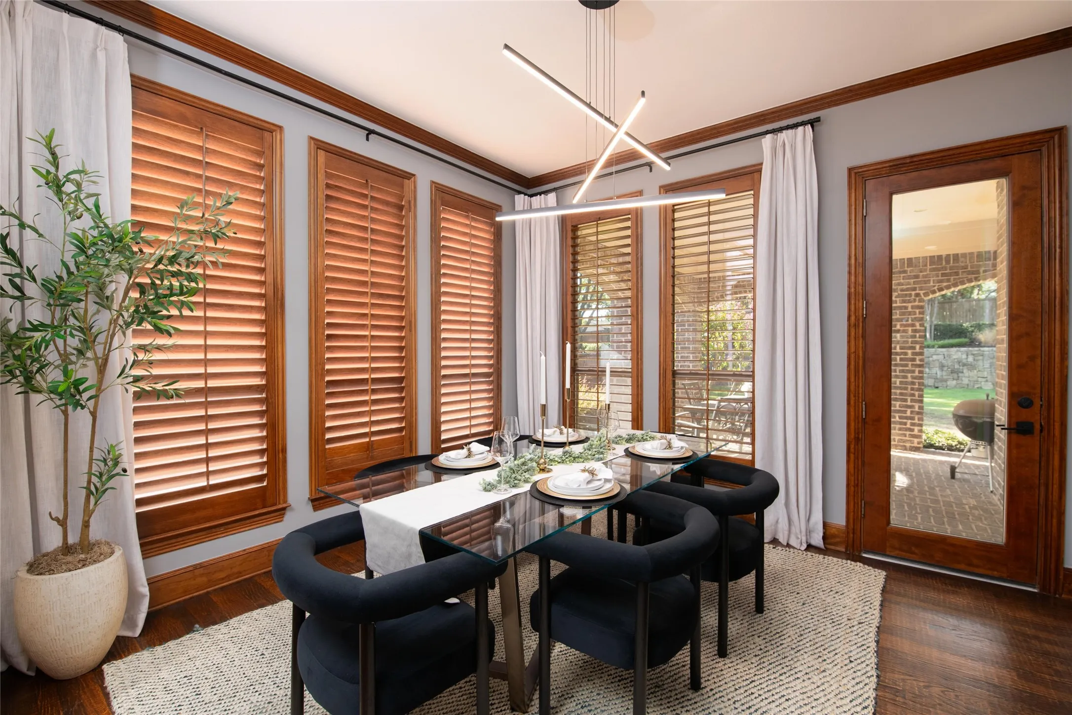 Natural light fills the casual dining area, creating a comfortable everyday gathering spot just steps from the kitchen and backyard.