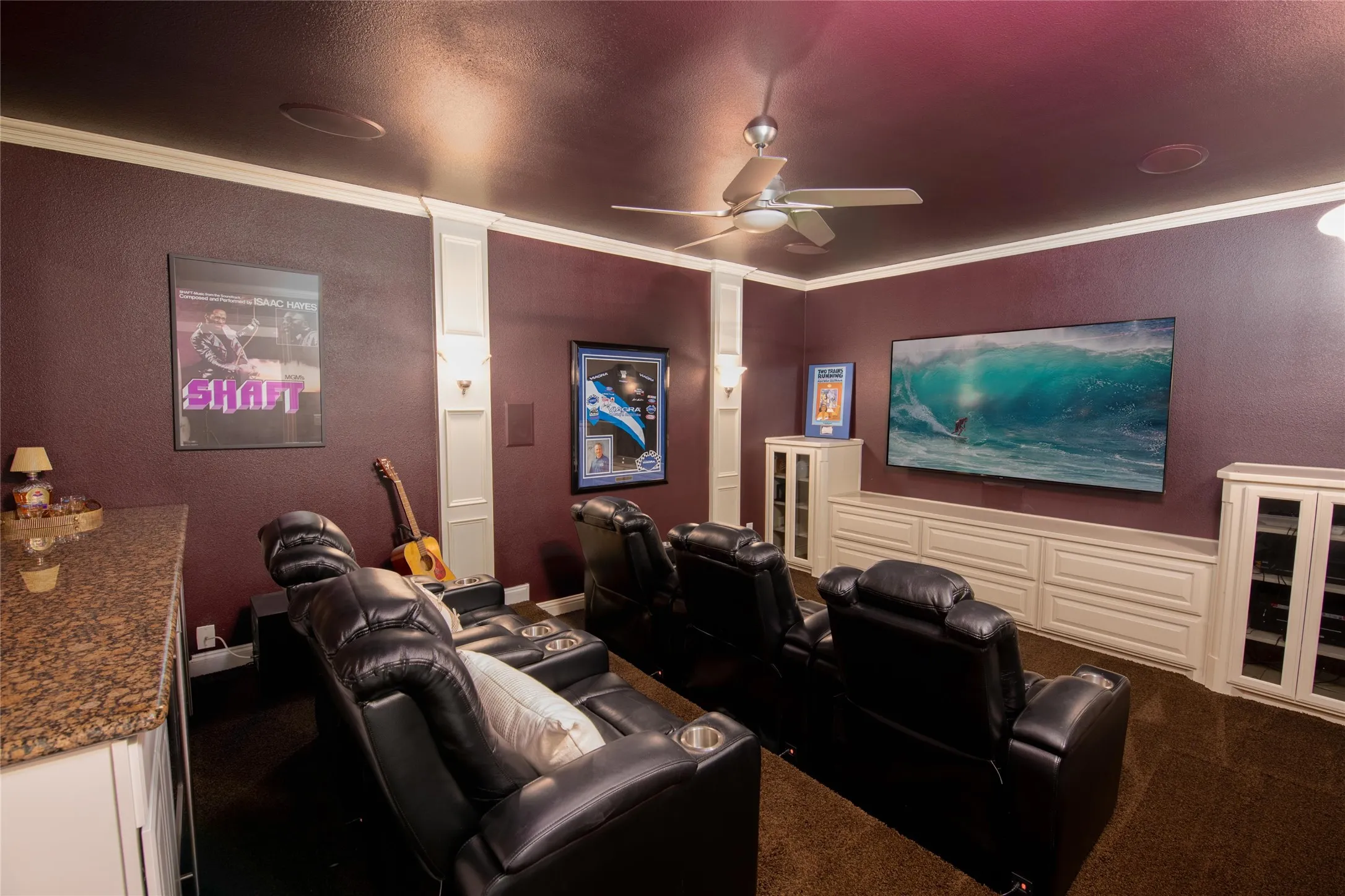 A dedicated tiered media room creates the perfect setting for movie nights, sporting events and at-home entertainment.