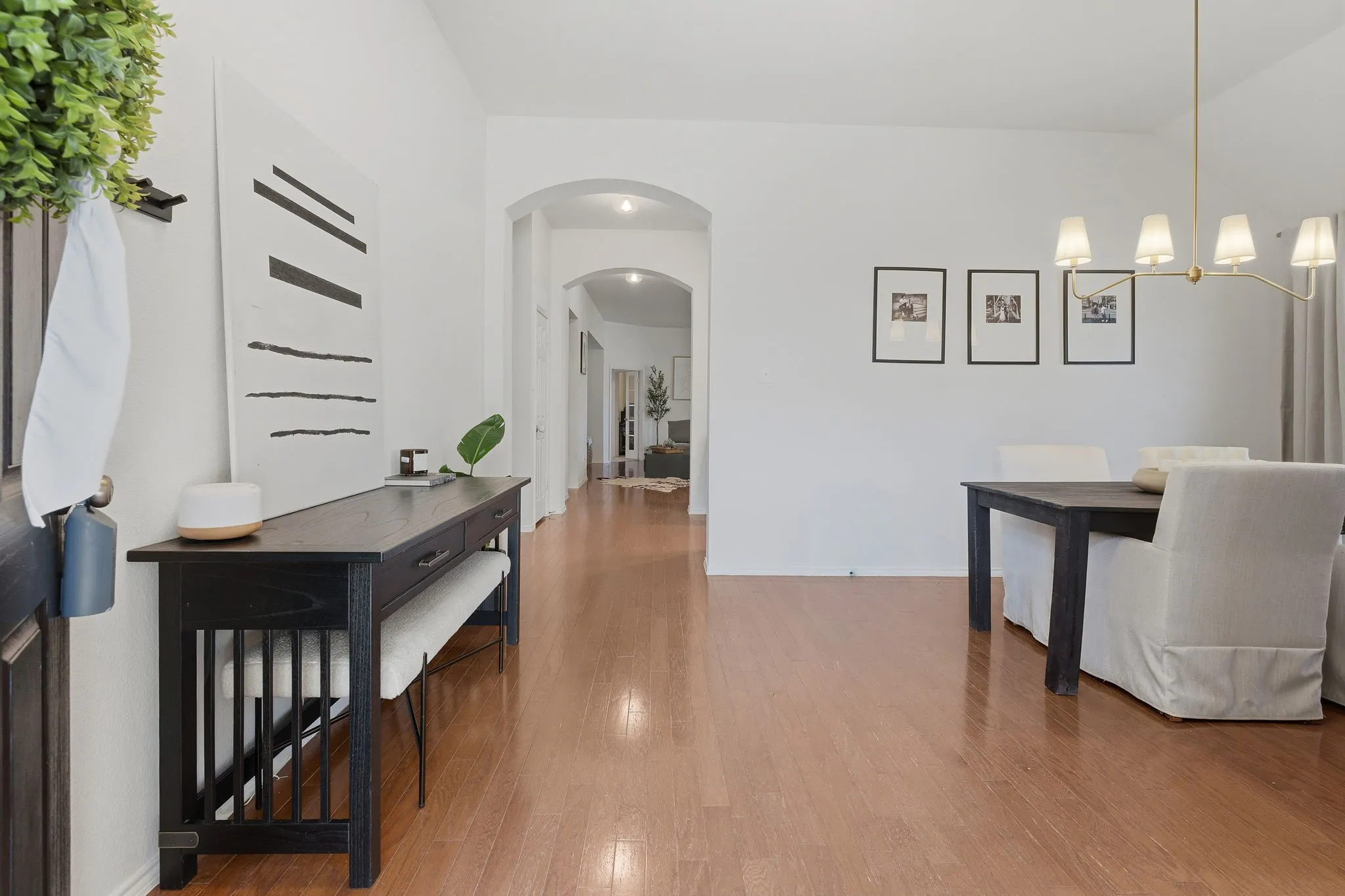 View from foyer into dining room and family room.