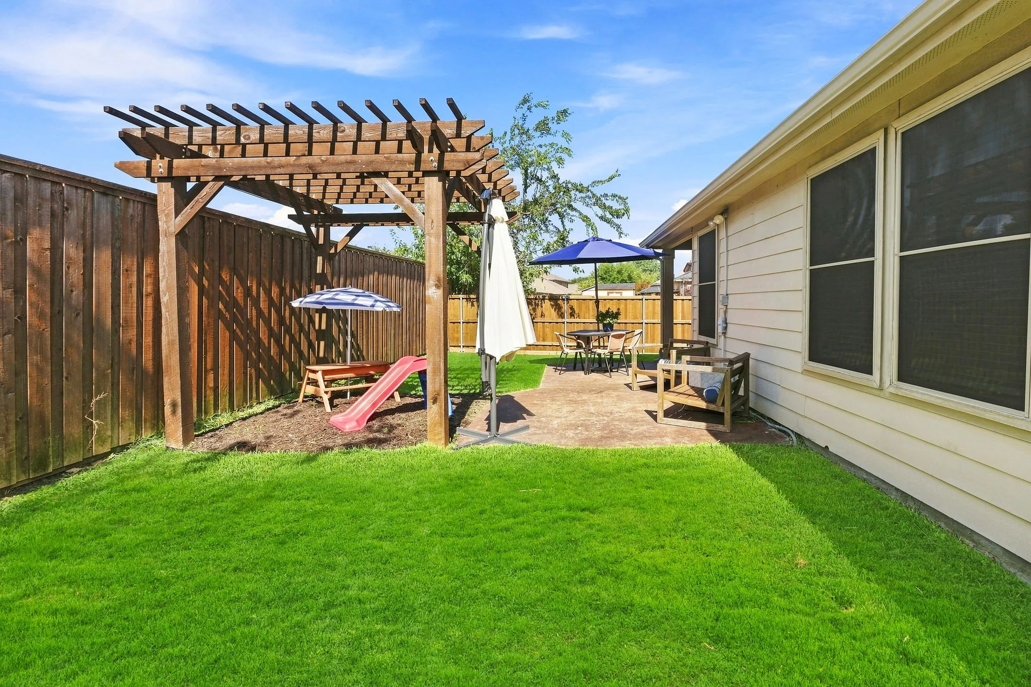 Additional wooden arbor for entertaining.