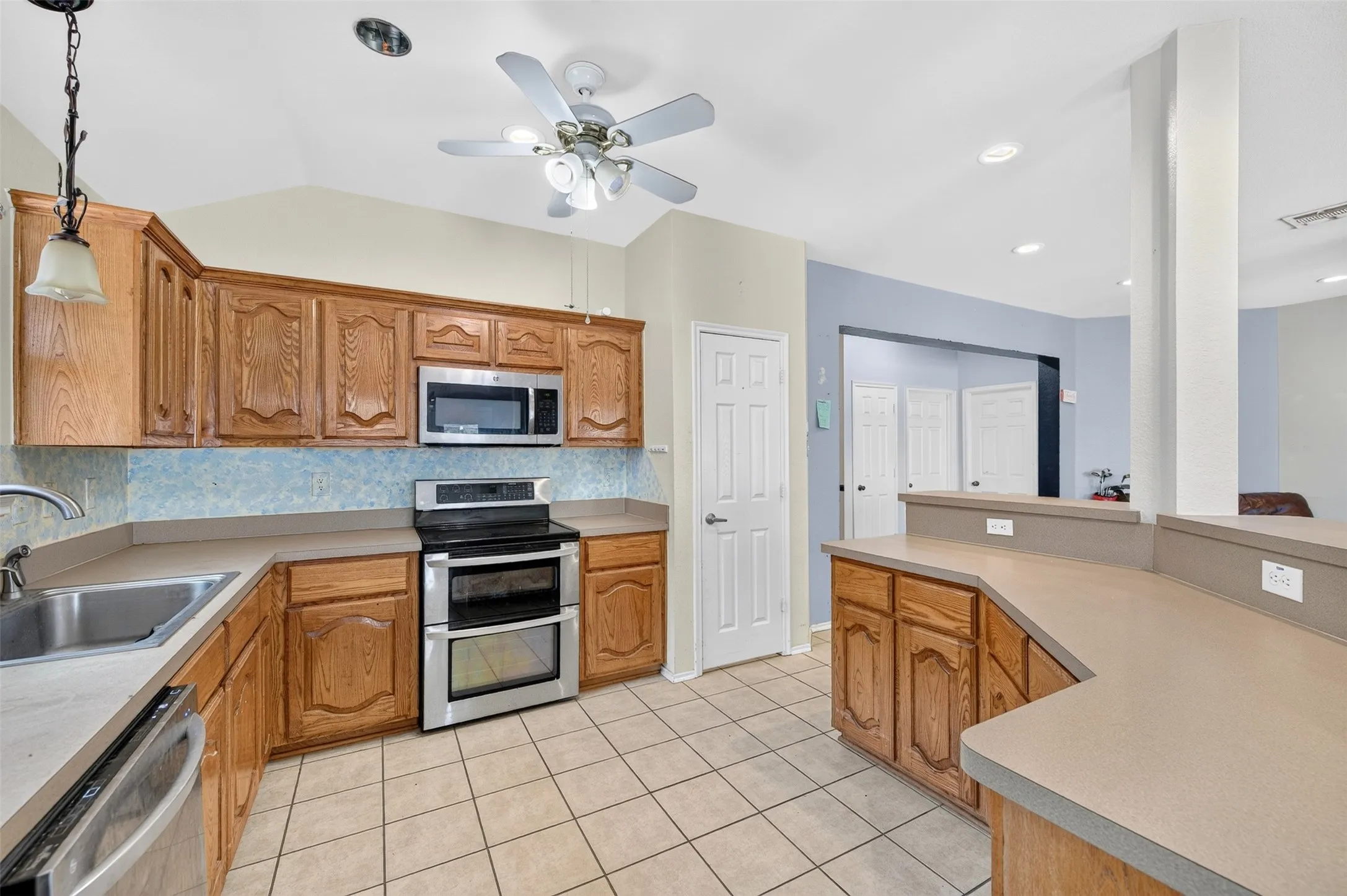 View of the Kitchen looking toward living room entry