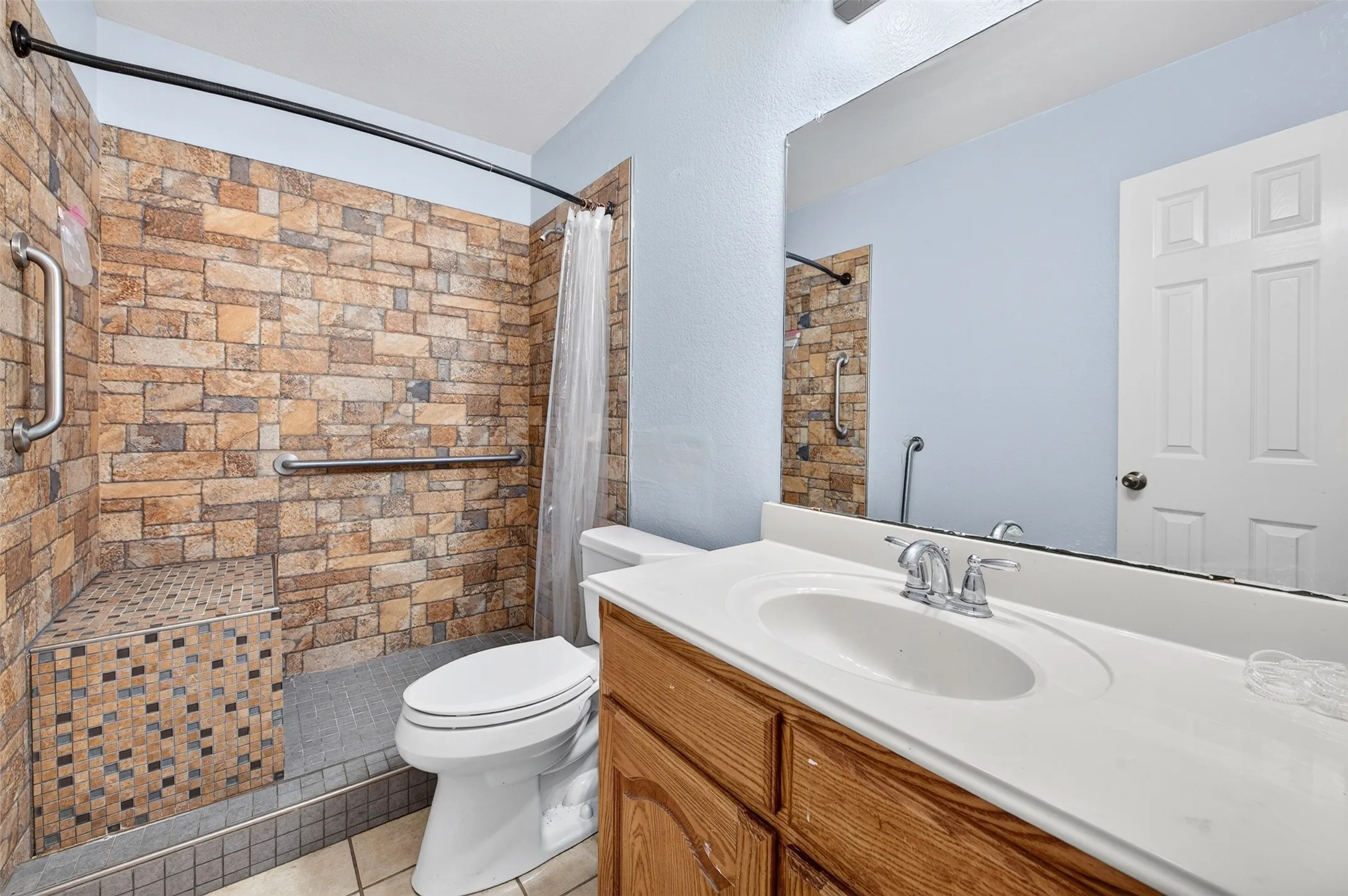 Guest Bathroom custom shower with grab bars